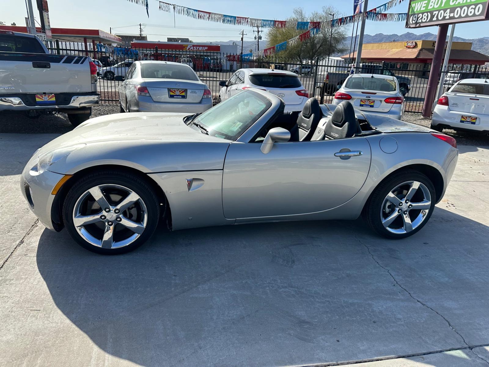 2007 Silver Pontiac Solstice GXP (1G2MG35X57Y) with an 2.0L L4 DOHC 16V TURBO engine, located at 2190 Hwy 95, Bullhead City, AZ, 86442, (928) 704-0060, 0.000000, 0.000000 - 2007 Pontiac Solstice GXP. only 44k miles. automatic. convertible. lots of fun to drive great gas mileage. - Photo #2