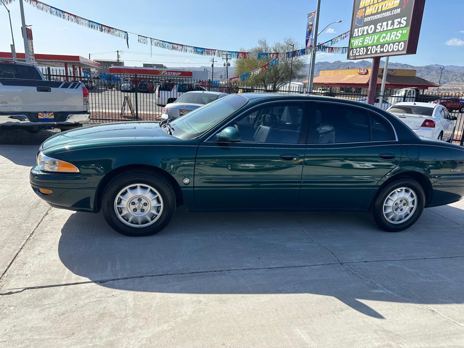 2000 Green Buick LeSabre Custom (1G4HP54KXYU) with an 3.8L V6 OHV 12V engine, 4-Speed Automatic Overdrive transmission, located at 2190 Hwy 95, Bullhead City, AZ, 86442, (928) 704-0060, 0.000000, 0.000000 - Photo #2