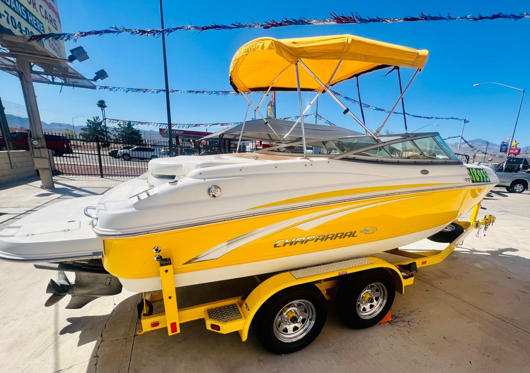 2007 Yellow chaparral 204SSI , located at 2190 Hwy 95, Bullhead City, AZ, 86442, (928) 704-0060, 0.000000, 0.000000 - 2007 Chaparral 20 ft. SSI model. always garaged. Super clean 2 owner. recently serviced. Brand new batteries. Free and clear titles. clean boat. clean interior bimini top is good. - Photo #5