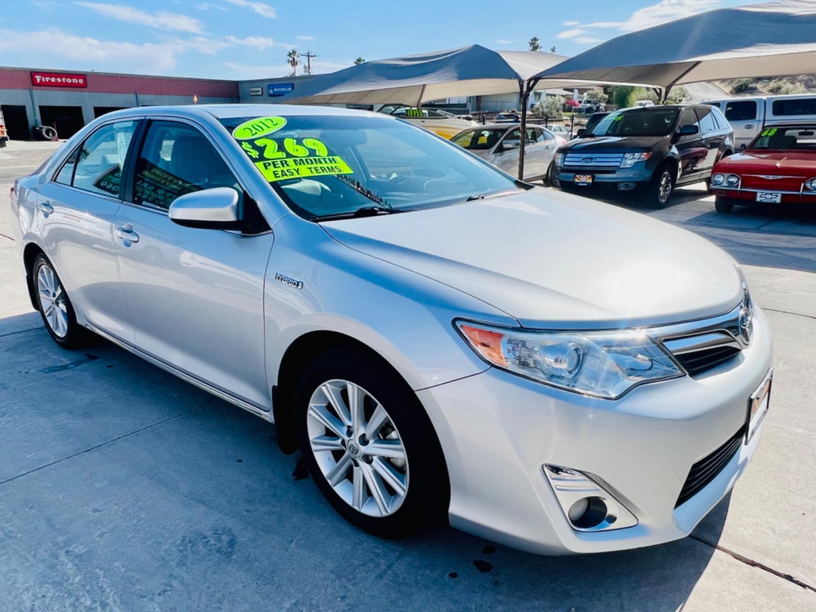 2012 Silver Toyota Camry Hybrid LE (4T1BD1FKXCU) with an 2.5L L4 DOHC 16V HYBRID engine, Continuously Variable Transmission transmission, located at 2190 Hwy 95, Bullhead City, AZ, 86442, (928) 704-0060, 0.000000, 0.000000 - Photo #0