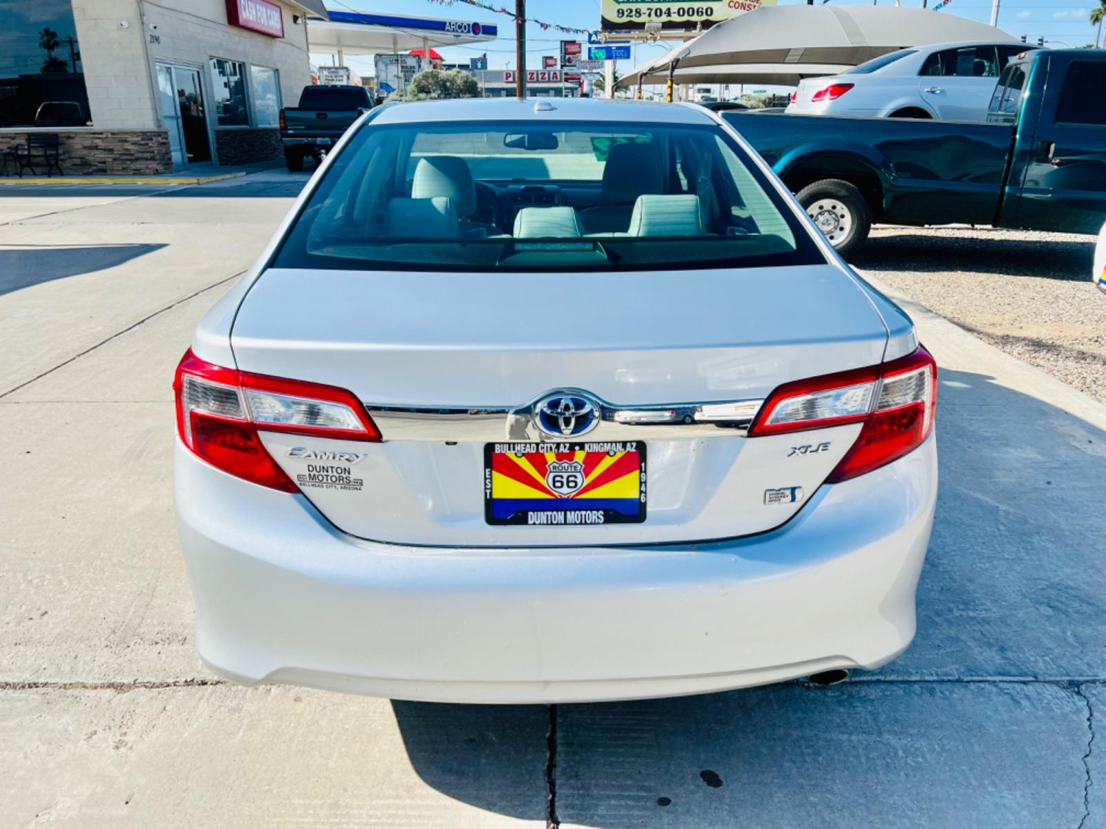 2012 Silver Toyota Camry Hybrid LE (4T1BD1FKXCU) with an 2.5L L4 DOHC 16V HYBRID engine, Continuously Variable Transmission transmission, located at 2190 Hwy 95, Bullhead City, AZ, 86442, (928) 704-0060, 0.000000, 0.000000 - Photo #1
