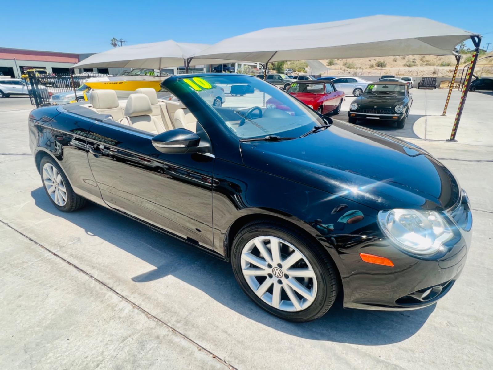 2010 Charcoal Volkswagen Eos Komfort (WVWBA7AHXAV) with an 2.0L L4 DOHC 16V engine, 6-Speed Automatic transmission, located at 2190 Hwy 95, Bullhead City, AZ, 86442, (928) 704-0060, 0.000000, 0.000000 - 2010 Volkswagen Eos. Hard top Convertible. Clean carfax. only 109k miles. Automatic, leather loaded. Financing available. - Photo #0