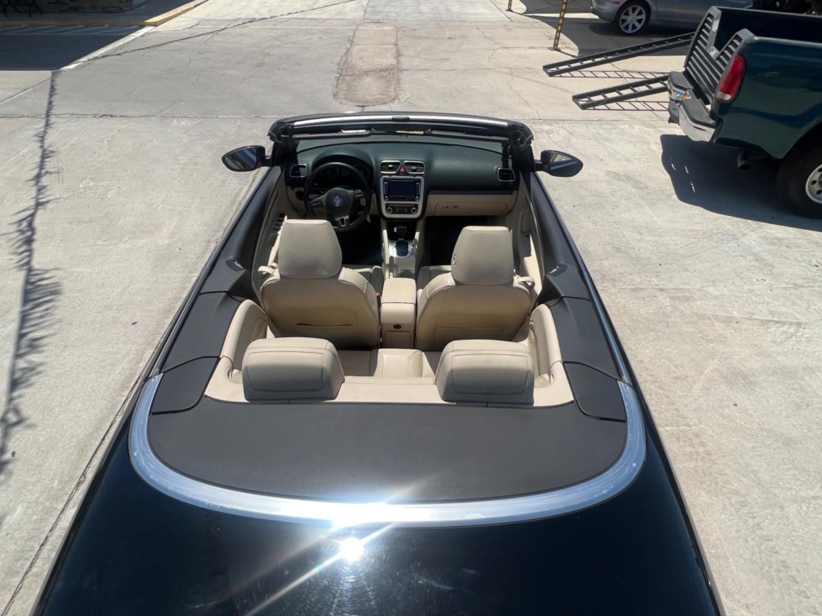 2010 Charcoal Volkswagen Eos Komfort (WVWBA7AHXAV) with an 2.0L L4 DOHC 16V engine, 6-Speed Automatic transmission, located at 2190 Hwy 95, Bullhead City, AZ, 86442, (928) 704-0060, 0.000000, 0.000000 - 2010 Volkswagen Eos. Hard top Convertible. Clean carfax. only 109k miles. Automatic, leather loaded. Financing available. - Photo #8