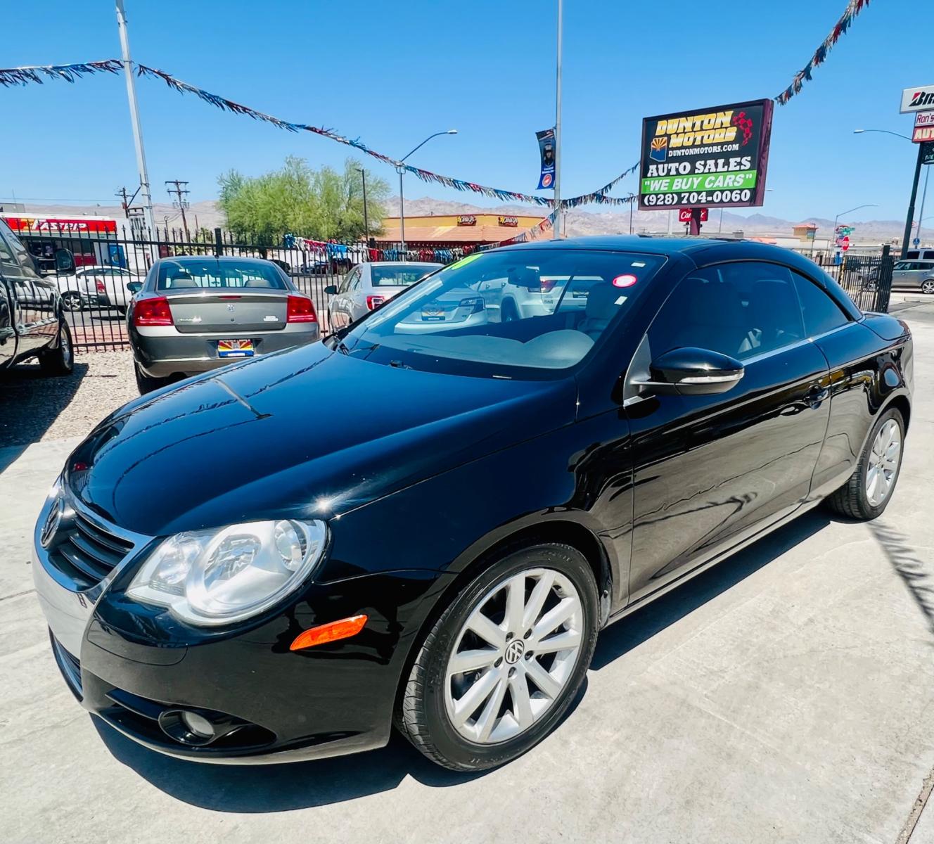 2010 Charcoal Volkswagen Eos Komfort (WVWBA7AHXAV) with an 2.0L L4 DOHC 16V engine, 6-Speed Automatic transmission, located at 2190 Hwy 95, Bullhead City, AZ, 86442, (928) 704-0060, 0.000000, 0.000000 - 2010 Volkswagen Eos. Hard top Convertible. Clean carfax. only 109k miles. Automatic, leather loaded. Financing available. - Photo #3