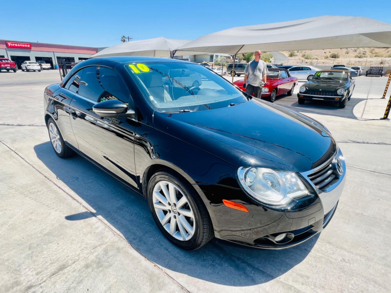 2010 Charcoal Volkswagen Eos Komfort (WVWBA7AHXAV) with an 2.0L L4 DOHC 16V engine, 6-Speed Automatic transmission, located at 2190 Hwy 95, Bullhead City, AZ, 86442, (928) 704-0060, 0.000000, 0.000000 - 2010 Volkswagen Eos. Hard top Convertible. Clean carfax. only 109k miles. Automatic, leather loaded. Financing available. - Photo #4