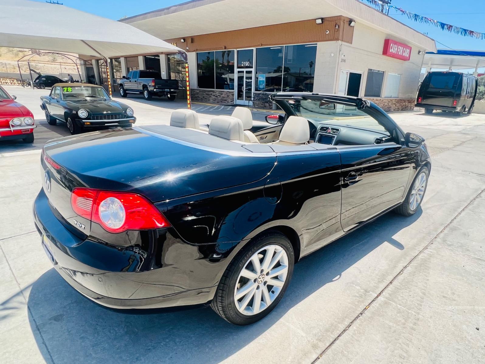 2010 Charcoal Volkswagen Eos Komfort (WVWBA7AHXAV) with an 2.0L L4 DOHC 16V engine, 6-Speed Automatic transmission, located at 2190 Hwy 95, Bullhead City, AZ, 86442, (928) 704-0060, 0.000000, 0.000000 - 2010 Volkswagen Eos. Hard top Convertible. Clean carfax. only 109k miles. Automatic, leather loaded. Financing available. - Photo #7