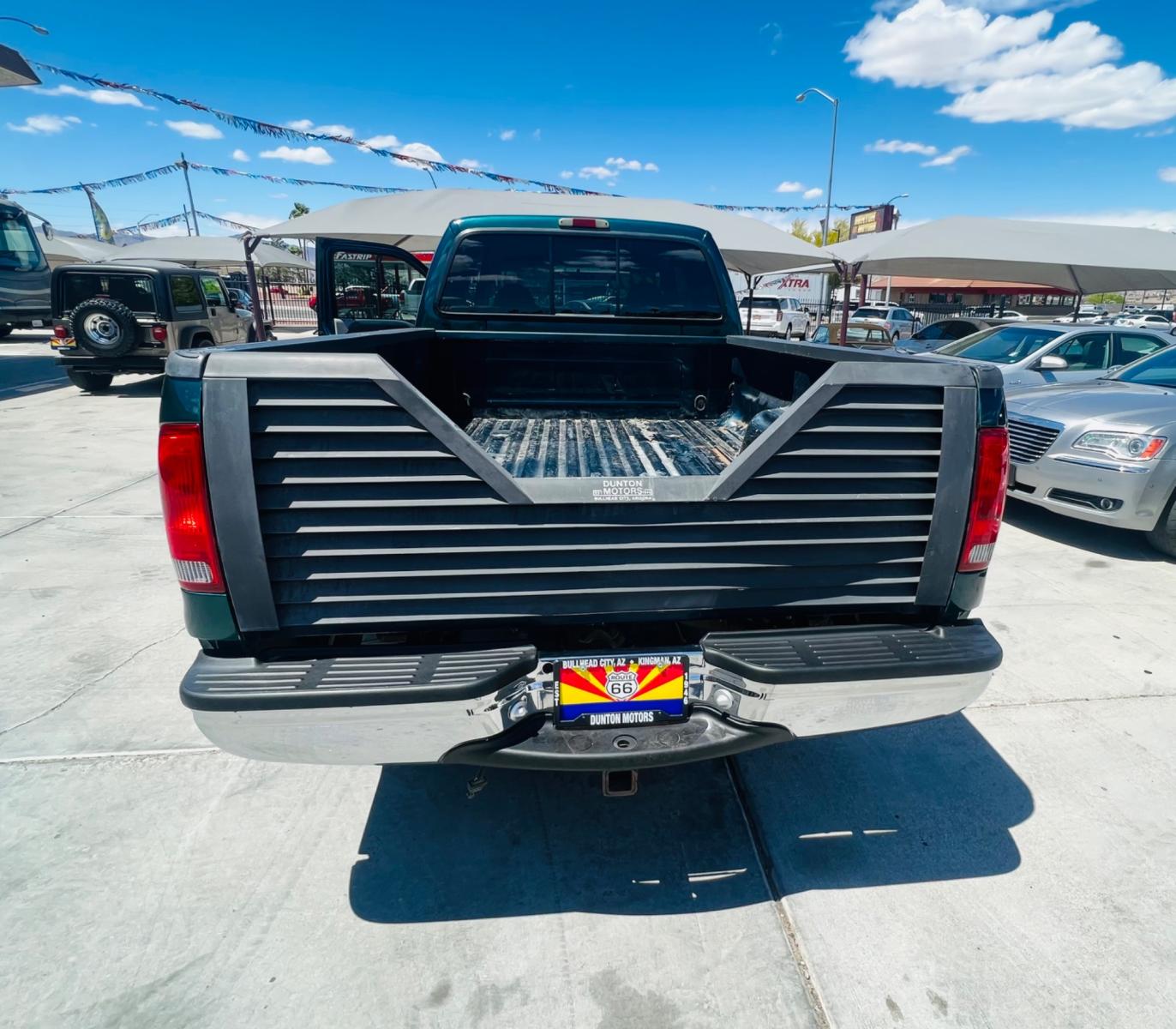 1999 Green Ford F-250 SD Lariat Crew Cab LWB 2WD (1FTNW20F4XE) with an 7.3L V8 OHV 16V TURBO DIESEL engine, located at 2190 Hwy 95, Bullhead City, AZ, 86442, (928) 704-0060, 0.000000, 0.000000 - 1999 Ford F250 crew cab long bed 7.3 powerstroke diesel. seats 6. fresh new paint. new window tint. brand new stereo with bluetooth. Completely serviced, lots of new parts. new ac system Ice cold a/c. runs and drives great. financing available. - Photo #6