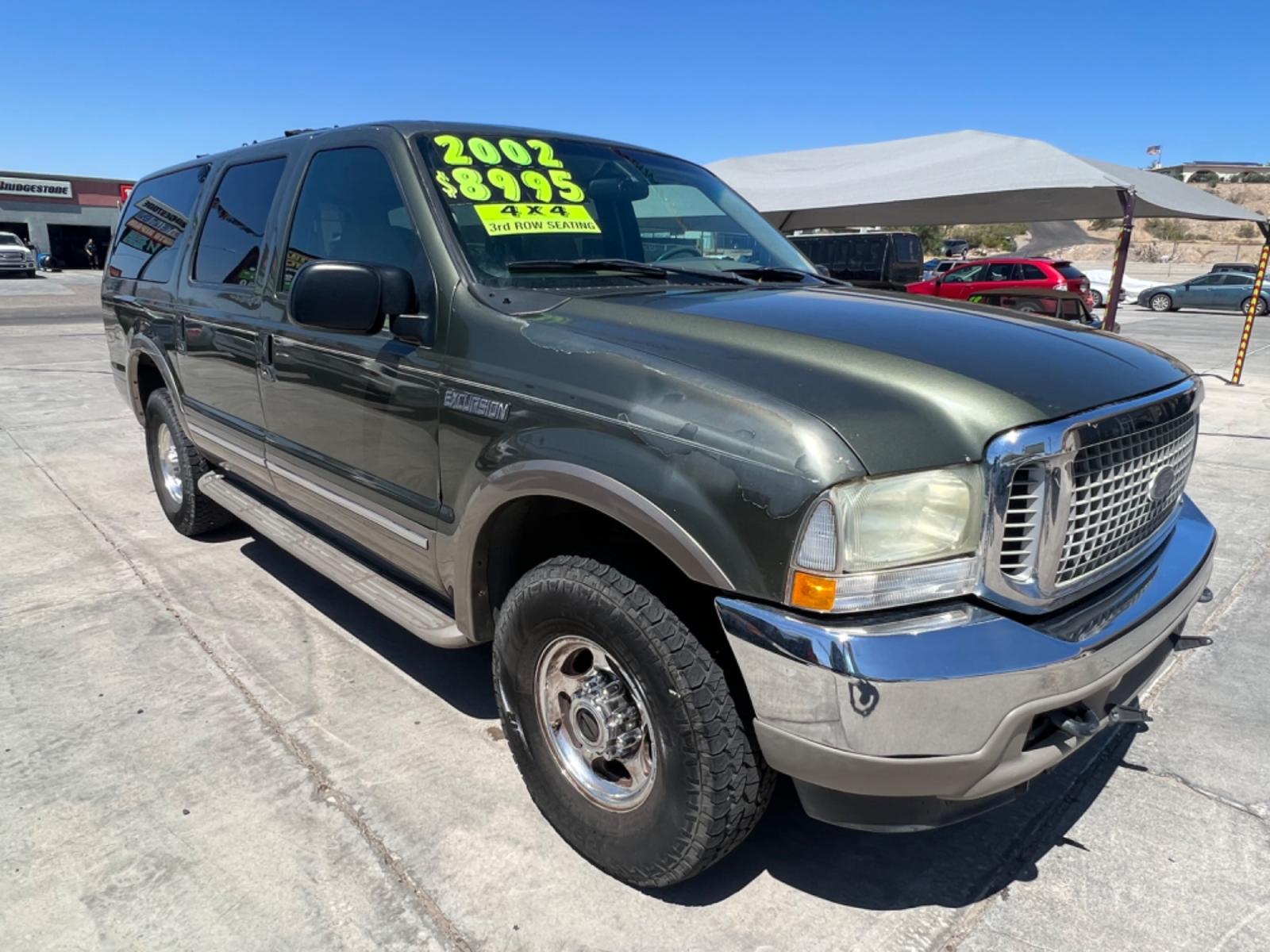2002 Green Ford Excursion Limited 6.8L 4WD (1FMNU43S32E) with an 6.8L V10 SOHC 20V engine, 4-Speed Automatic Overdrive transmission, located at 2190 Hwy 95, Bullhead City, AZ, 86442, (928) 704-0060, 0.000000, 0.000000 - 2002 Ford Excursion 4 wheel drive , leather , 3rd row. Limited edition. oversized off road tires. completely serviced. new serpentine belt. hoses. brakes. etc. runs and drives great .rear a/c . financing available on approved credit. - Photo #1