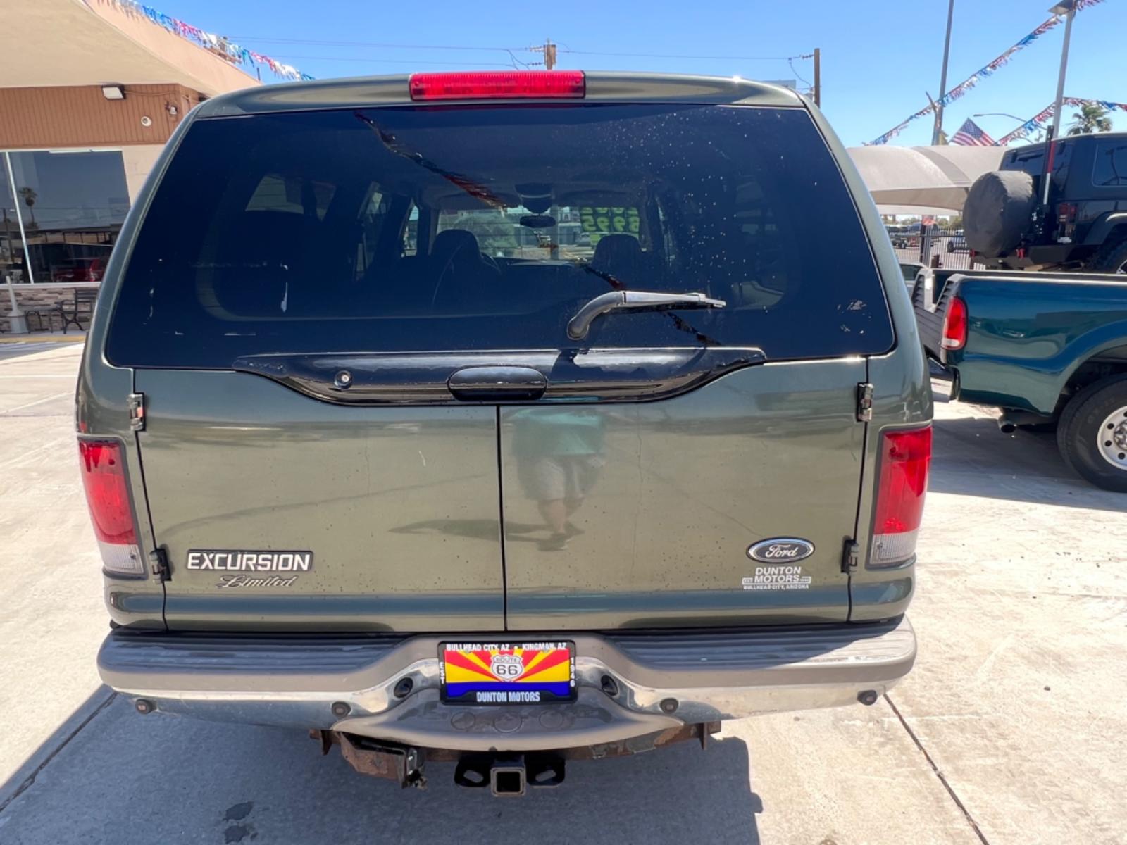 2002 Green Ford Excursion Limited 6.8L 4WD (1FMNU43S32E) with an 6.8L V10 SOHC 20V engine, 4-Speed Automatic Overdrive transmission, located at 2190 Hwy 95, Bullhead City, AZ, 86442, (928) 704-0060, 0.000000, 0.000000 - 2002 Ford Excursion 4 wheel drive , leather , 3rd row. Limited edition. oversized off road tires. completely serviced. new serpentine belt. hoses. brakes. etc. runs and drives great .rear a/c . financing available on approved credit. - Photo #4
