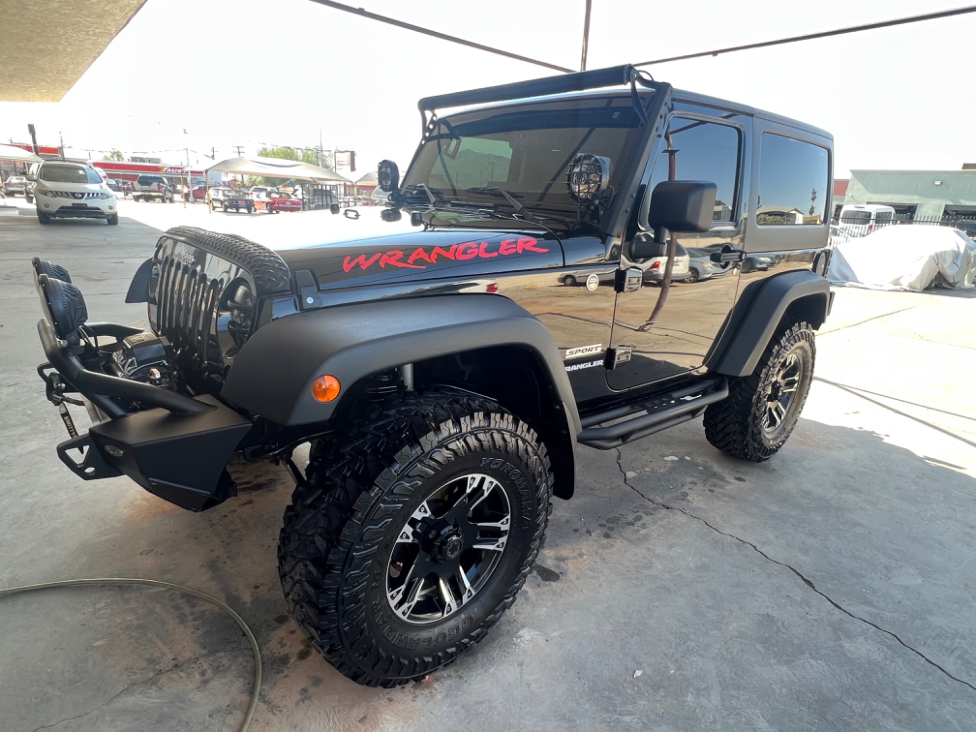 photo of 2010 Jeep Wrangler Sport 4WD 6cylinder 6 speed manual transmission. lots of extras. 