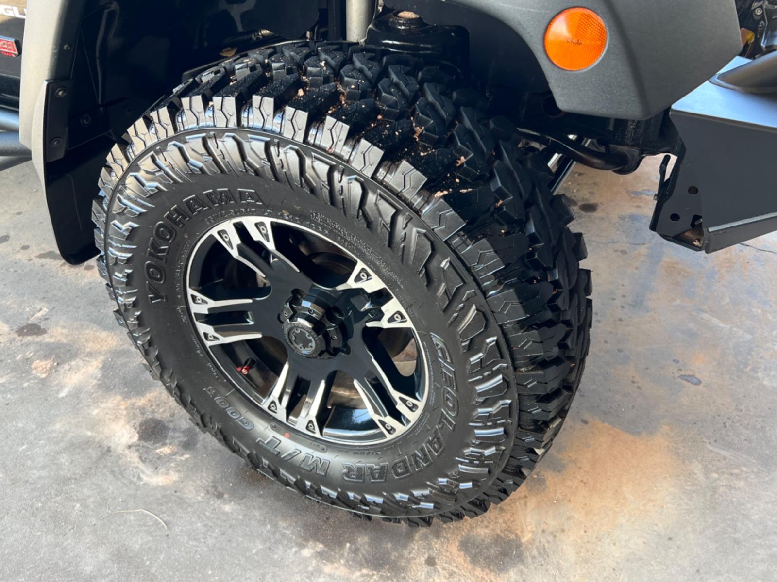 2010 Black Jeep Wrangler Sport 4WD (1J4AA2D18AL) with an 3.8L V6 OHV 12V engine, located at 2190 Hwy 95, Bullhead City, AZ, 86442, (928) 704-0060, 0.000000, 0.000000 - 2010 Jeep Wrangler sport .6 speed manual . 4x4 . Hard top . Cold ac . Lift kit custom tires wheels light bars winch . Custom steel bumpers . Lots of extras for the off road . Winch . Extra lights - Photo #3