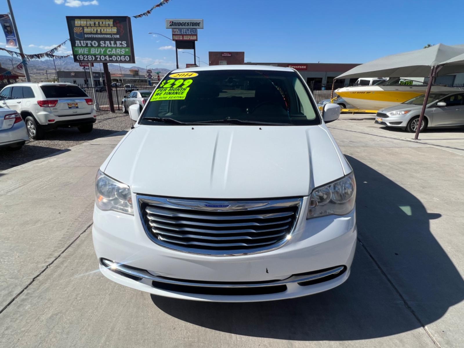 2014 White Chrysler Town and Country , located at 2190 Hwy 95, Bullhead City, AZ, 86442, (928) 704-0060, 0.000000, 0.000000 - 2014 Chryslter Town and Country Touring. Completely serviced. Runs and drives great. Free warranty. Free carfax. seats 7. bluetooth, backup camera, leather interior. fully loaded. power electric doors. keyless entry. stow and go seating v6 engine. This van has it all. IN house financing available. - Photo #2