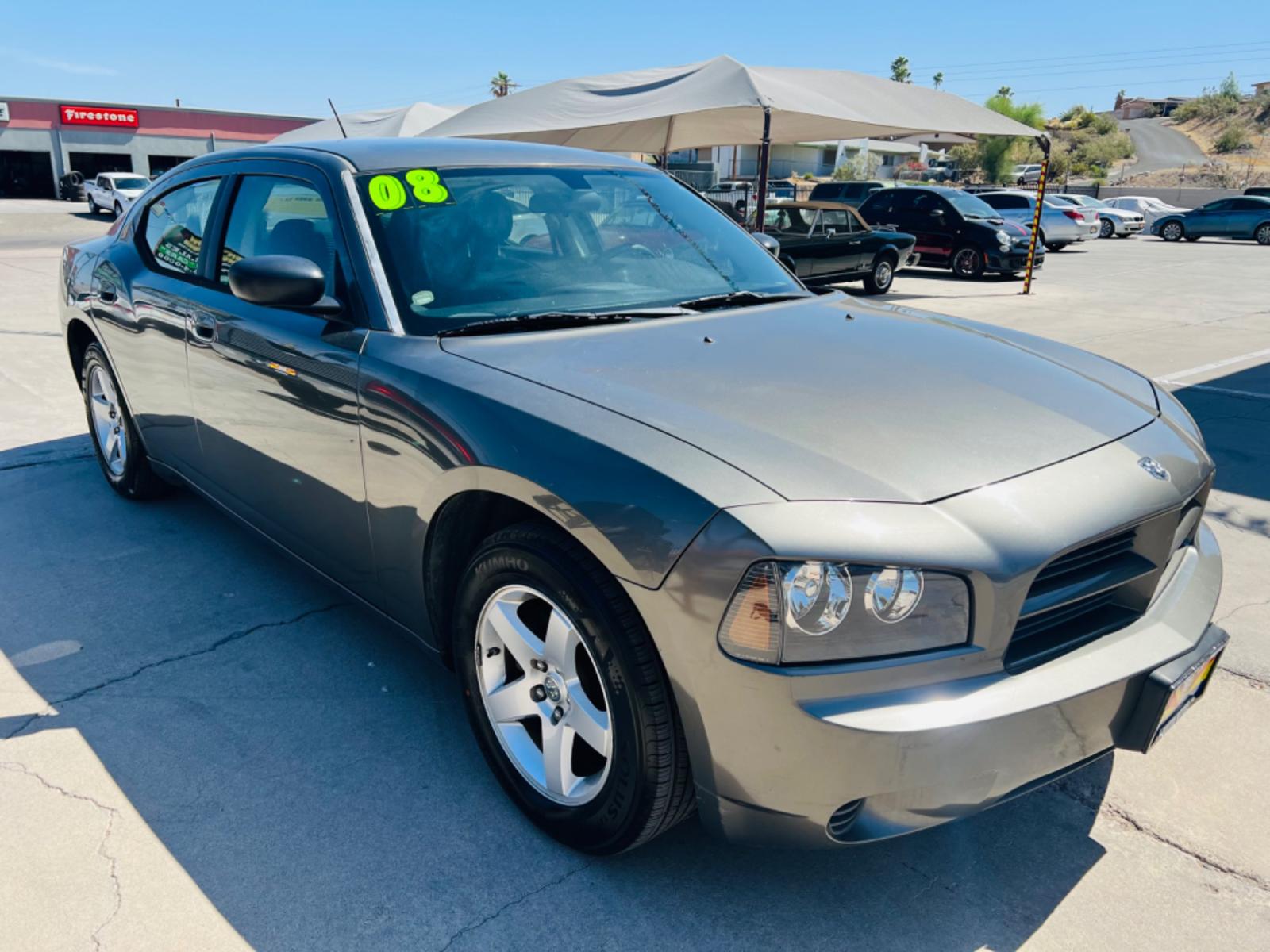 2008 Charcoal Dodge Charger SE (2B3KA43GX8H) with an 3.5L V6 SOHC 24V engine, 5-Speed Automatic Overdrive transmission, located at 2190 Hwy 95, Bullhead City, AZ, 86442, (928) 704-0060, 0.000000, 0.000000 - 2008 Dodge Charger SE. V6 automatic 120k miles. Completely serviced. Brand new tires. Ice cold ac. runs and drives great. In house financing available. Buy here Pay here. - Photo #0