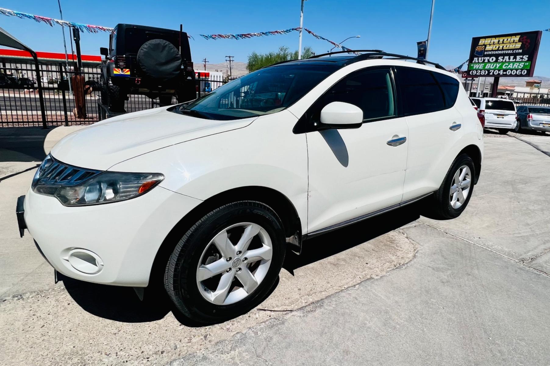 2009 White Nissan Murano , located at 2190 Hwy 95, Bullhead City, AZ, 86442, (928) 704-0060, 0.000000, 0.000000 - 2009 NIssan Murano all wheel drive. LE. leather . dual moonroof. fully loaded. 123k. New tires. Free warranty. In house financing available. - Photo #4