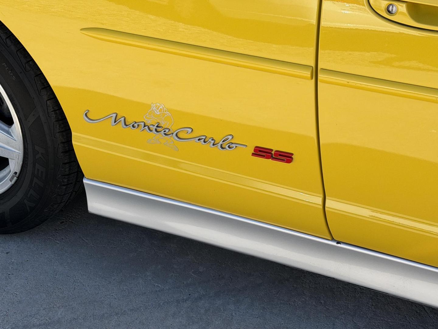 2002 Yellow /Black Chevrolet Monte Carlo SS , located at 2190 Hwy 95, Bullhead City, AZ, 86442, (928) 704-0060, 0.000000, 0.000000 - 2002 Chevrolet Monte Carlo SS custom.3.8 V6.. 123k miles. automatic. always garaged. Brand new tires. ice cold a/c.. In house financing available. yellow interior accents. Custom painted hood scoops. Custom 18in chrome wheels with firestone tires. Free carfax. 2 owners. Arizona car. Free warranty. - Photo#4