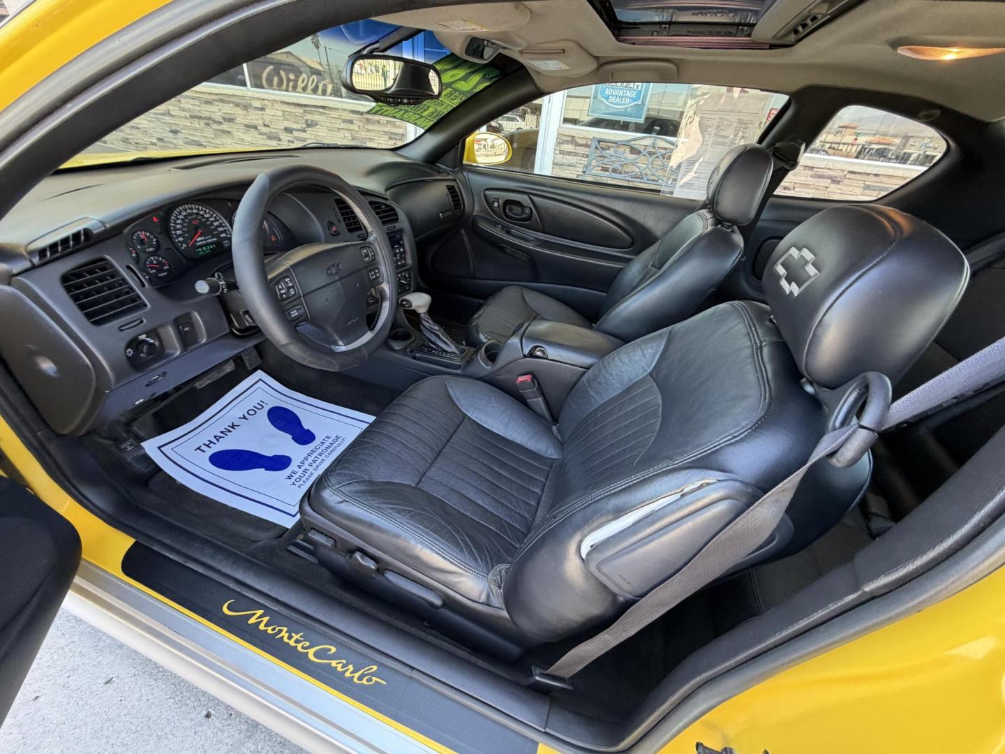 2002 Yellow /Black Chevrolet Monte Carlo SS , located at 2190 Hwy 95, Bullhead City, AZ, 86442, (928) 704-0060, 0.000000, 0.000000 - 2002 Chevrolet Monte Carlo SS custom.3.8 V6.. 123k miles. automatic. always garaged. Brand new tires. ice cold a/c.. In house financing available. yellow interior accents. Custom painted hood scoops. Custom 18in chrome wheels with firestone tires. Free carfax. 2 owners. Arizona car. Free warranty. - Photo#7