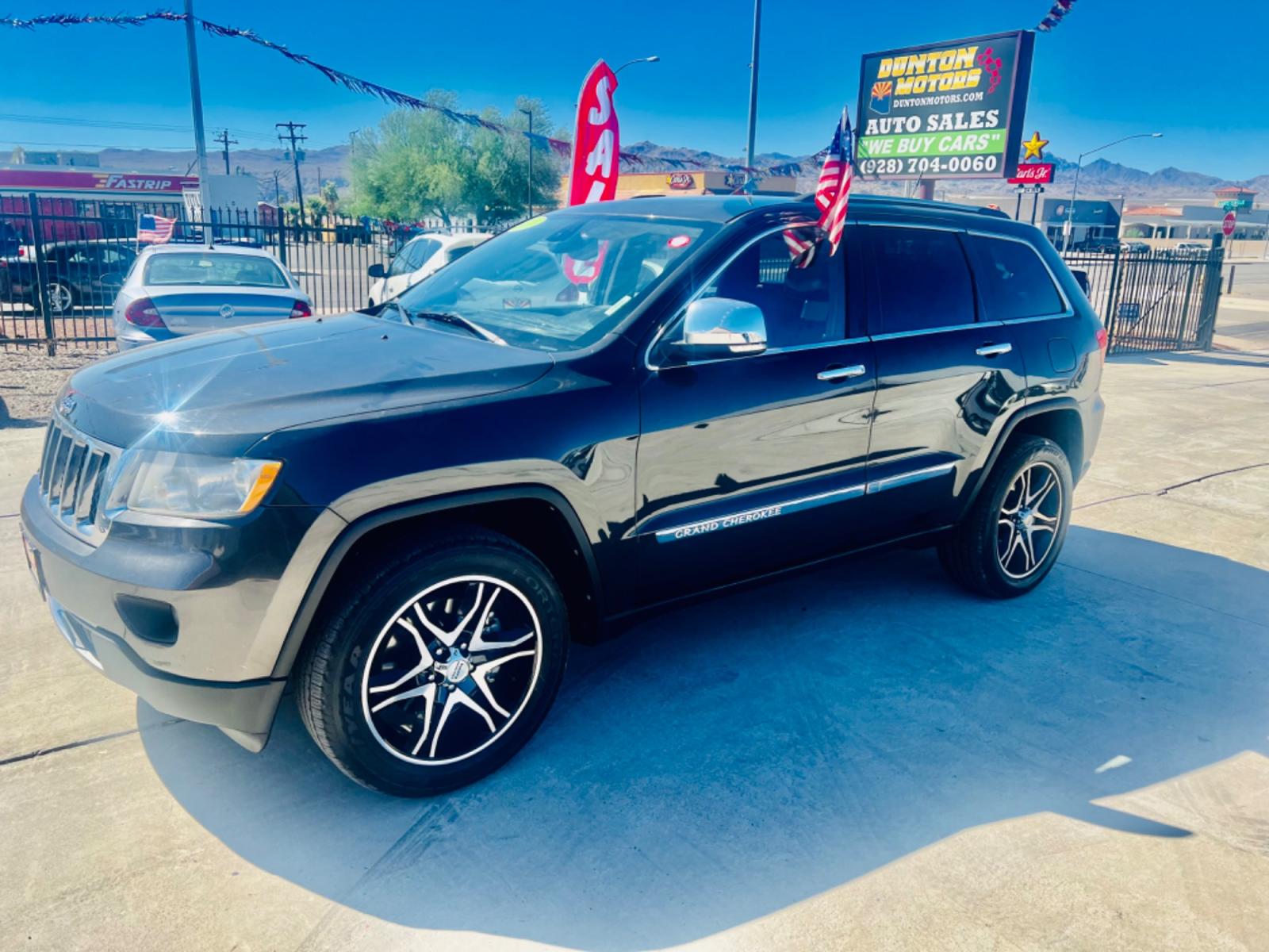 2011 Black Jeep Grand Cherokee Overland 4WD (1J4RR6GT8BC) with an 5.7L V8 OHV 16V engine, 5-Speed Automatic transmission, located at 2190 Hwy 95, Bullhead City, AZ, 86442, (928) 704-0060, 0.000000, 0.000000 - Photo #11