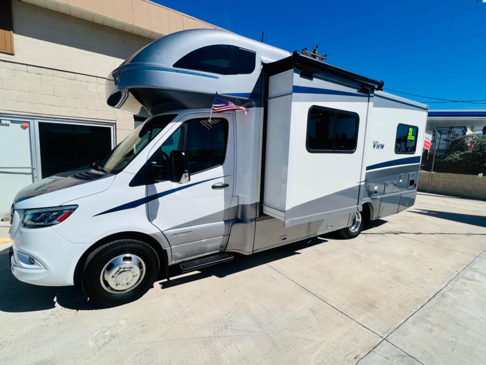 2021 White Winnebago View , located at 2190 Hwy 95, Bullhead City, AZ, 86442, (928) 704-0060, 0.000000, 0.000000 - 2021 Winnebago view . Mercedes Benz diesel . Only 4300 miles . Clear title . Electric slide . Diesel generator with 8 hours . Solar charging system . Bluetooth . Navigation . Super clean - Photo #2