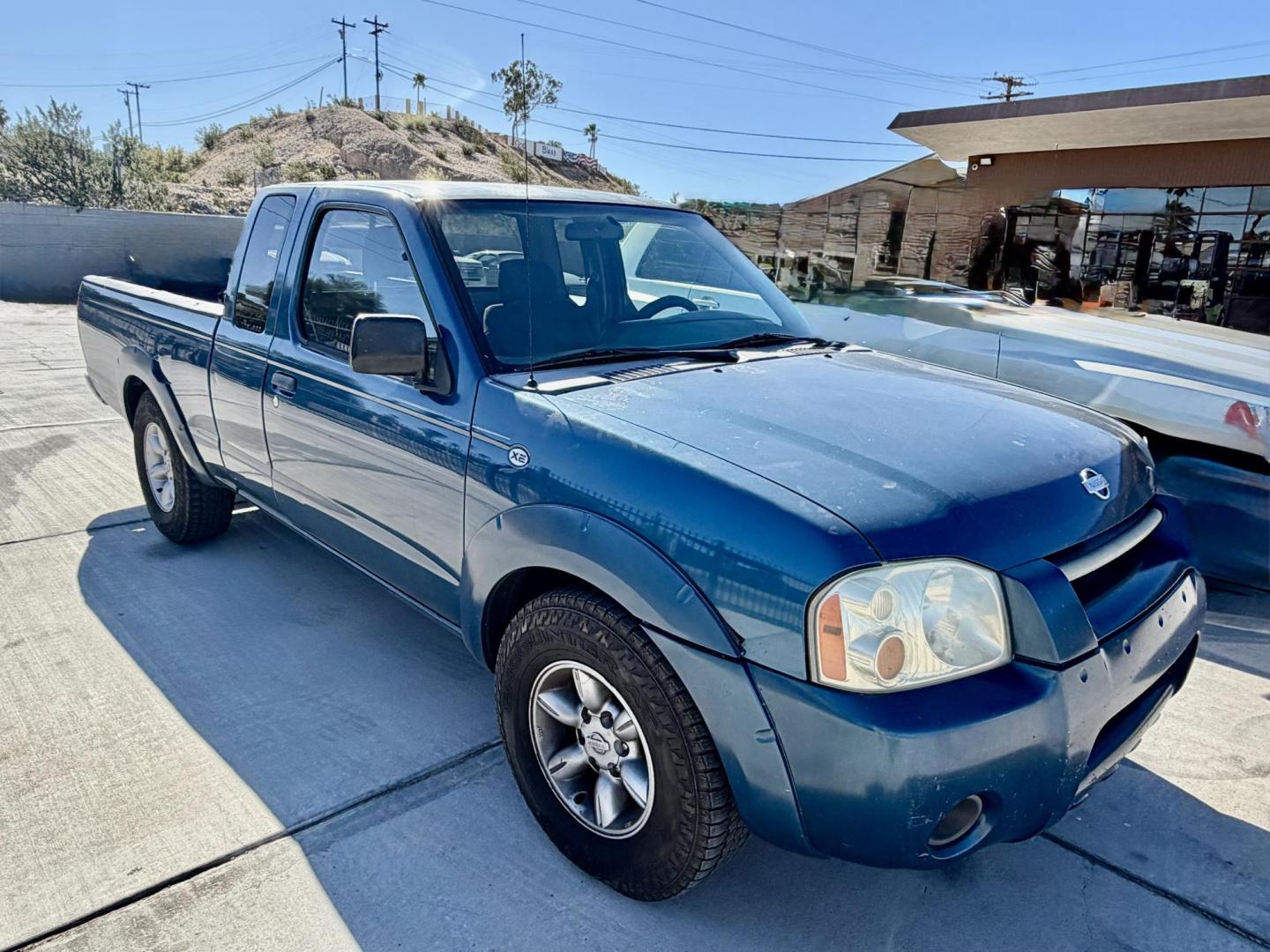 2001 Blue Nissan Frontier (1N6DD26S41C) , located at 2190 Hwy 95, Bullhead City, AZ, 86442, (928) 704-0060, 0.000000, 0.000000 - 2001 Nissan frontier xe king cab. 4 cylinder. 142k miles. Manual . Ice cold ac. Lots of extras done to truck new transmission done here locally. . New tires new radiator. Fully serviced. New clutch, new brakes, pads. Runs and drives great. Financing available. In house financing .buy here pay here - Photo#0
