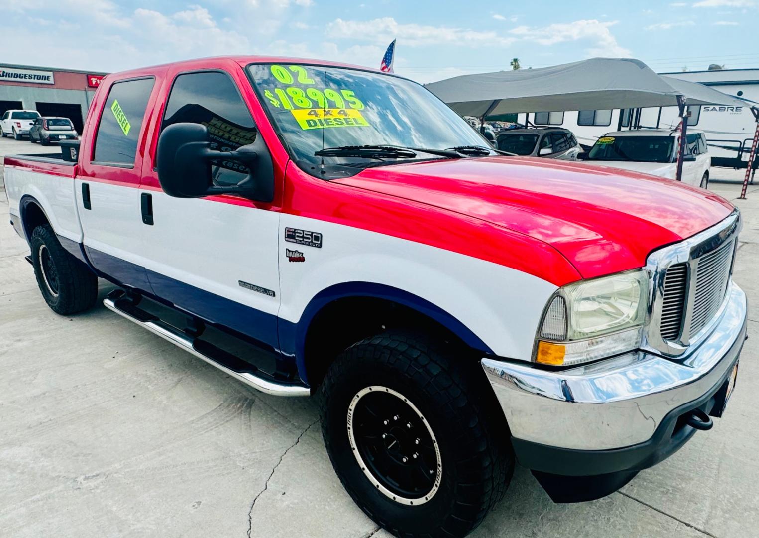2002 Ford F250 , located at 2190 Hwy 95, Bullhead City, AZ, 86442, (928) 704-0060, 0.000000, 0.000000 - On consignment 2002 ford f250 Crew cab short bed 7.3 diesel 4x4 . Banks power system . Lots of extras . Leather loaded - Photo#13