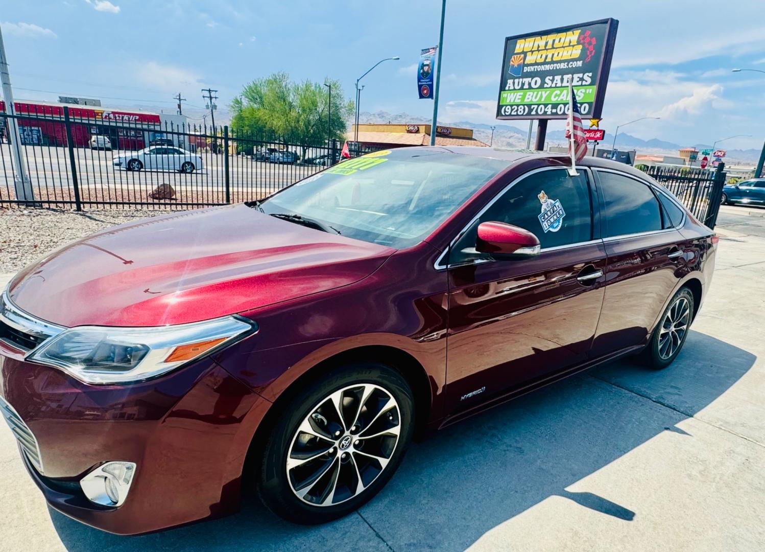 2013 Red Toyota Avalon (4T1BD1EB8DU) , located at 2190 Hwy 95, Bullhead City, AZ, 86442, (928) 704-0060, 0.000000, 0.000000 - 1 owner. immaculate. financing available on approved credit. . 2013 toyota Avalon Hybrid Premium XLE. free and clear title. on consignment. - Photo#1