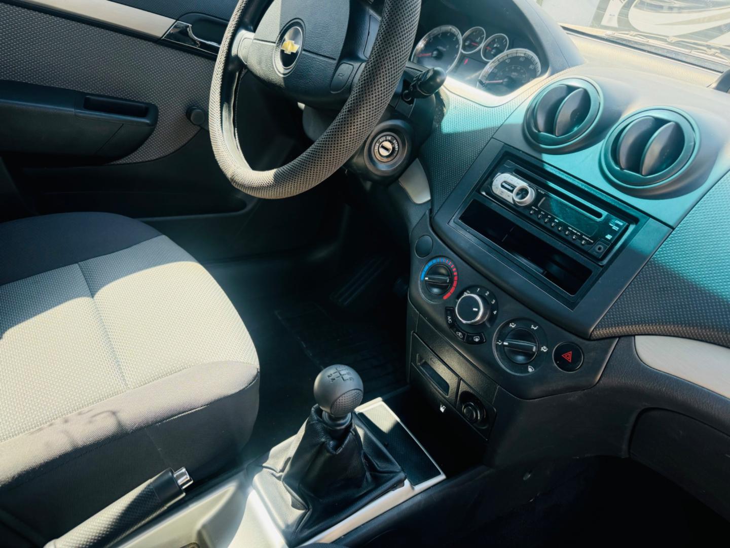 2009 Silver Chevrolet Aveo5 (KL1TD66E79B) , located at 2190 Hwy 95, Bullhead City, AZ, 86442, (928) 704-0060, 0.000000, 0.000000 - 1 owner. yes only 20k miles. clean carfax. Absolutely clean like new. always garaged. In house financing available. great gas mileage car. up to 29 miles per gallon. We Finance. - Photo#1