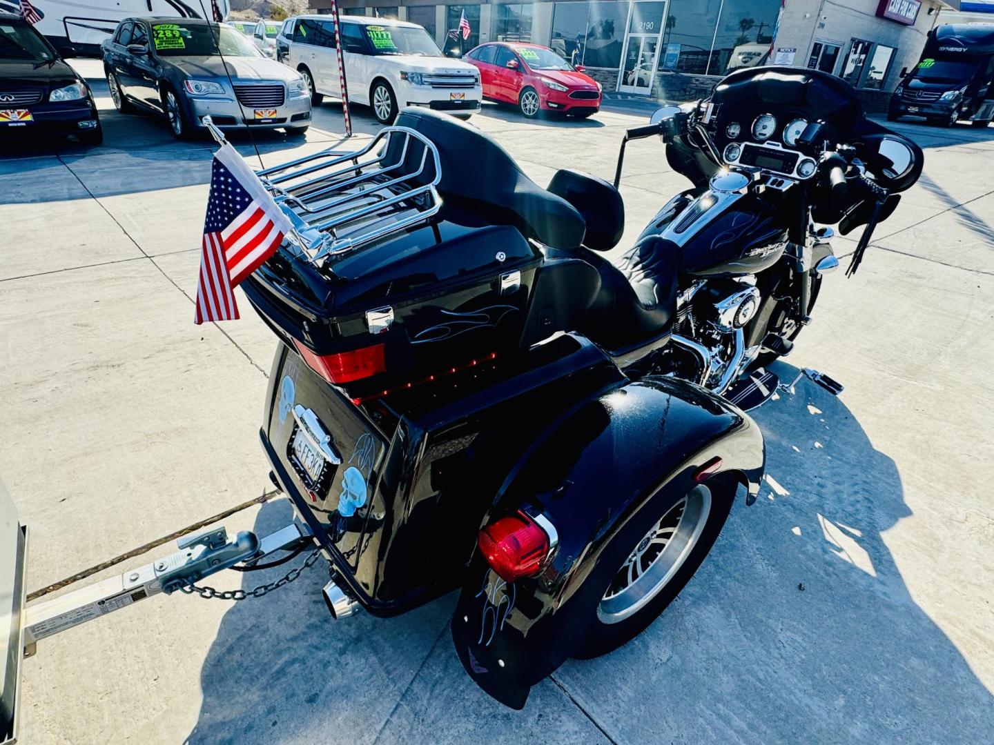2010 Black /black Harley-Davidson FLHXXX - (1HD1MBM37AB) , located at 2190 Hwy 95, Bullhead City, AZ, 86442, (928) 704-0060, 0.000000, 0.000000 - 2010 Harley Davidson trike with trailer. custom. super clean . lots of extras, 38k miles. always garaged. has full dresser, radio, full windshield. full cover . dyno jet tuner. custom pin striping. this bikes a looker. custom trailer to match. $17900 o.b.o. free and clear titles for both. - Photo#8