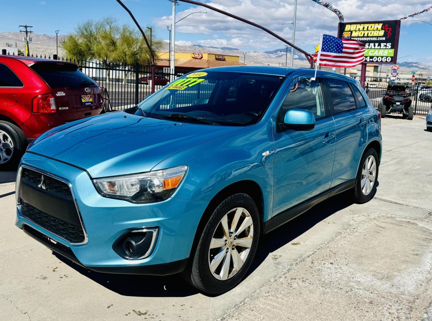 2014 blue Mitsubishi Outlander Sport ES AWC (4A4AR3AUXEE) with an 2.0L L4 DOHC 16V engine, Continuously Variable Transmission transmission, located at 2190 Hwy 95, Bullhead City, AZ, 86442, (928) 704-0060, 0.000000, 0.000000 - 2014 Mitsubishi Outlander sport. all wheel drive. free warranty. free carfax. completely serviced. IN house financing available. buy here pay here. we finance. - Photo#2