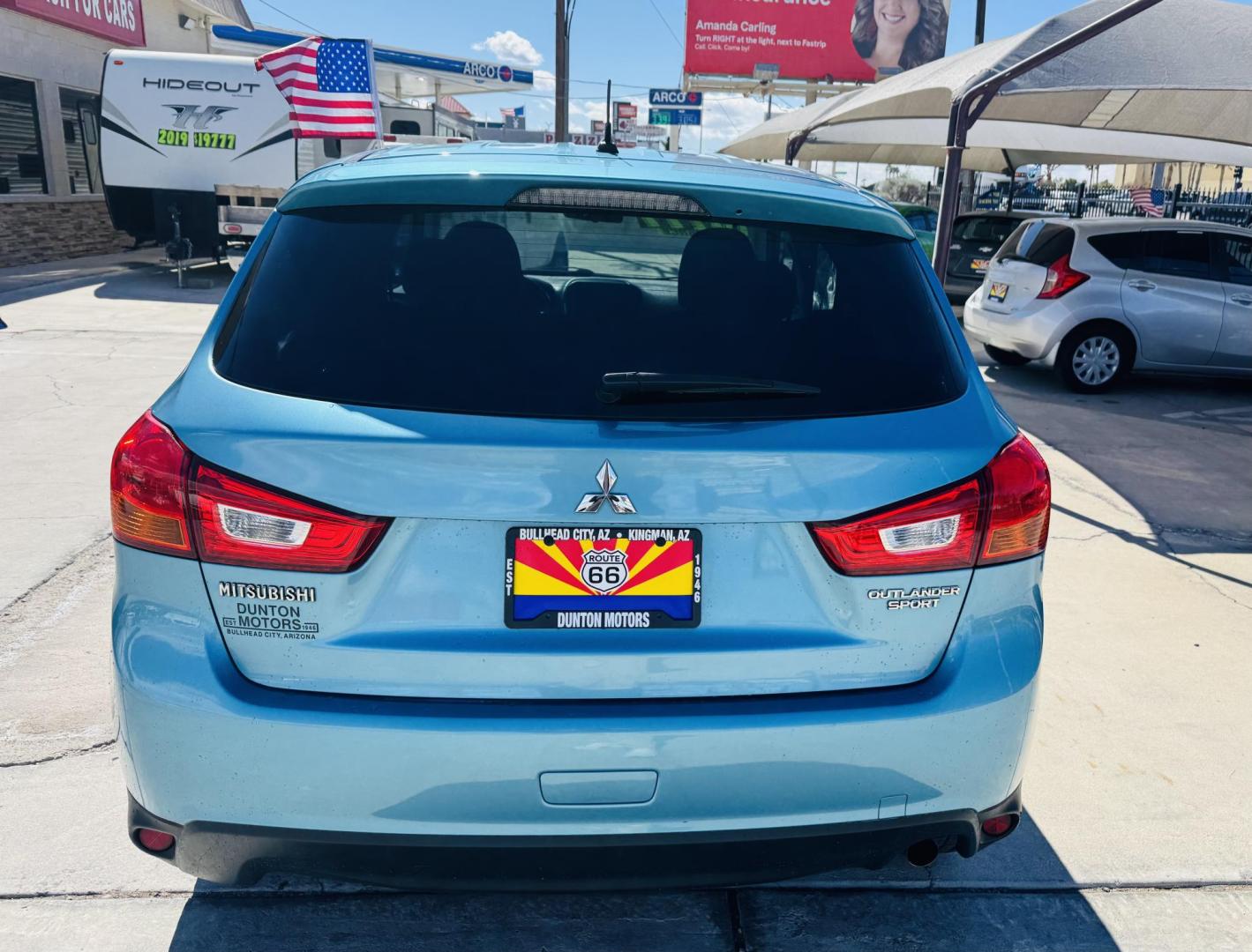 2014 blue Mitsubishi Outlander Sport ES AWC (4A4AR3AUXEE) with an 2.0L L4 DOHC 16V engine, Continuously Variable Transmission transmission, located at 2190 Hwy 95, Bullhead City, AZ, 86442, (928) 704-0060, 0.000000, 0.000000 - 2014 Mitsubishi Outlander sport. all wheel drive. free warranty. free carfax. completely serviced. IN house financing available. buy here pay here. we finance. - Photo#3