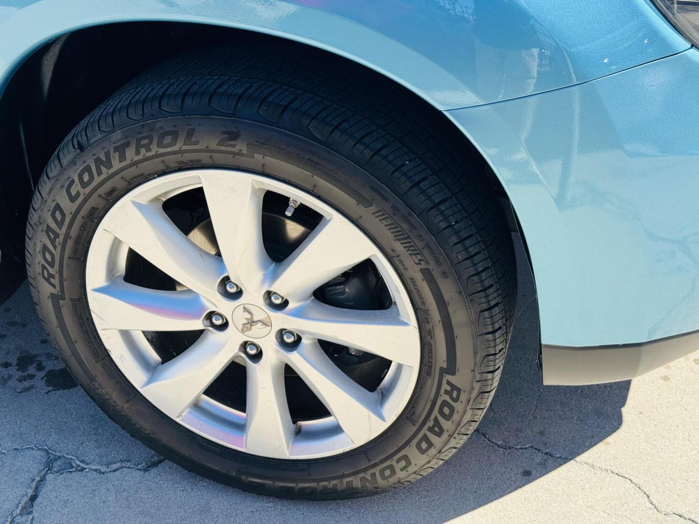 2014 blue Mitsubishi Outlander Sport ES AWC (4A4AR3AUXEE) with an 2.0L L4 DOHC 16V engine, Continuously Variable Transmission transmission, located at 2190 Hwy 95, Bullhead City, AZ, 86442, (928) 704-0060, 0.000000, 0.000000 - 2014 Mitsubishi Outlander sport. all wheel drive. free warranty. free carfax. completely serviced. IN house financing available. buy here pay here. we finance. - Photo#6