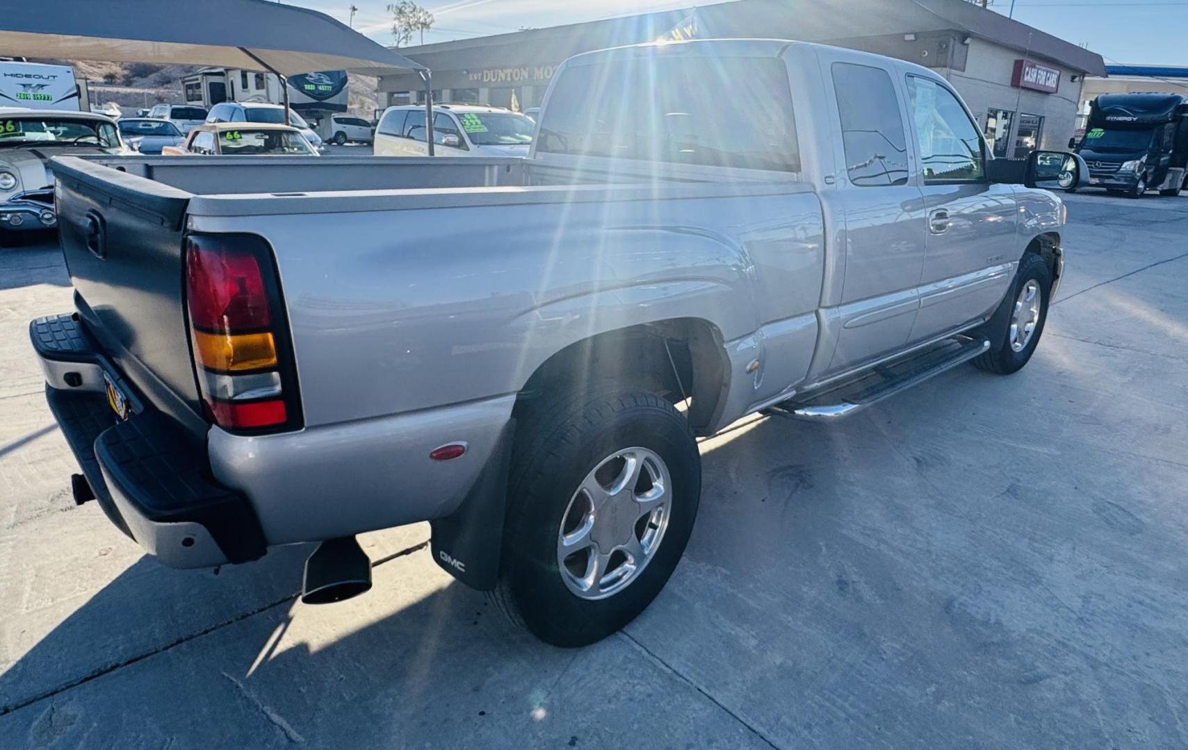 2004 Silver GMC Sierra 1500 Denali Ext. Cab AWD (2GTFK69UX41) with an 6.0L V8 OHV 16V engine, 4-Speed Automatic Overdrive transmission, located at 2190 Hwy 95, Bullhead City, AZ, 86442, (928) 704-0060, 0.000000, 0.000000 - On consignment. 2004 gmc sierra denali all wheel drive. leather, loaded. lots of new parts with receipt. runs and drives great. elderly owned. - Photo#3