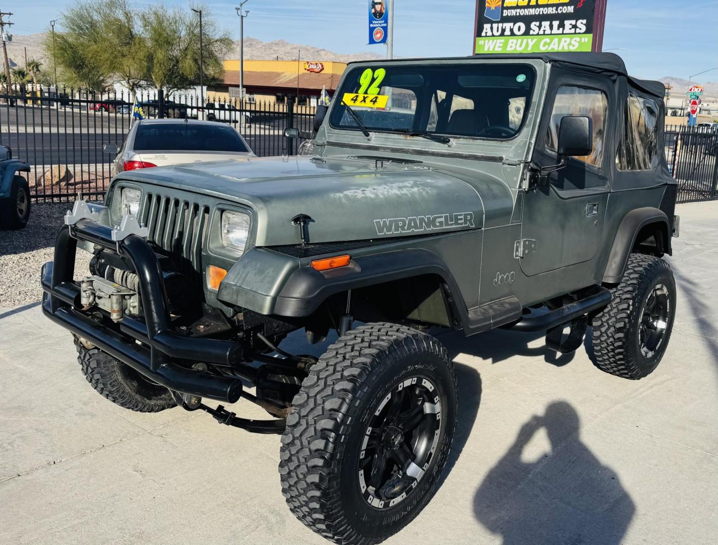 1992 green Jeep Wrangler S (2J4FY19P0NJ) with an 2.5L L4 OHV 8V engine, 5-Speed Manual Overdrive transmission, located at 2190 Hwy 95, Bullhead City, AZ, 86442, (928) 704-0060, 0.000000, 0.000000 - 1992 jeep wrangler custom. lifted custom tires/wheels. off road special. 4 cylinder manual. 4 in rough country lift kit. hit the trailer with this one. free and clear title. soft top. new hijacklift. lots of extras a must see. - Photo#2