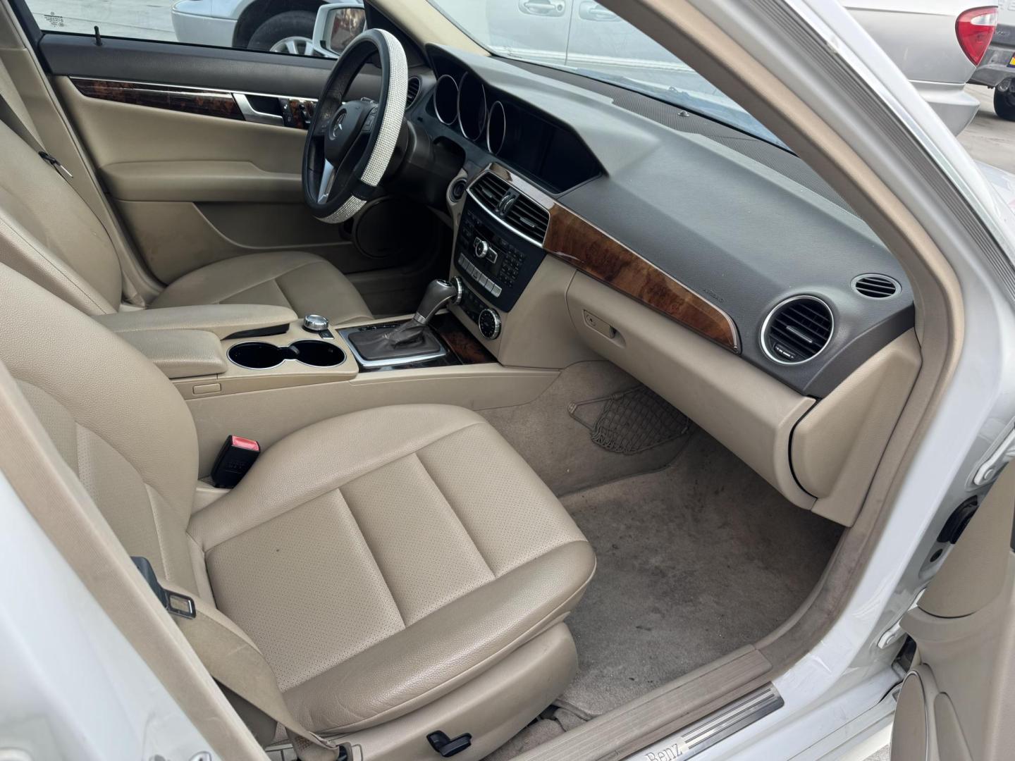 2013 White /Tan Mercedes-Benz C-Class C250 Sport Sedan (WDDGF4HBXDR) with an 3.0L V6 DOHC 16V engine, 7-Speed Automatic transmission, located at 2190 Hwy 95, Bullhead City, AZ, 86442, (928) 704-0060, 0.000000, 0.000000 - 2013 Mercedes Benz C250. Only 82k miles . Custom stereo fresh window tint . , moonroof . Backup camera . Navigation. . Free warranty . Free CARFAX . In house financing - Photo#1