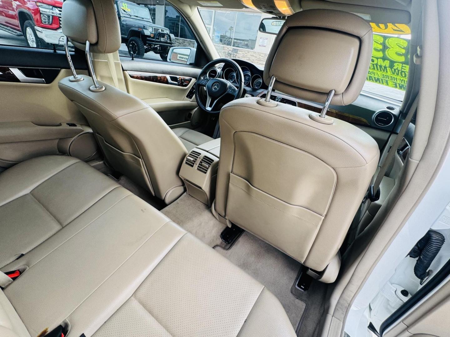 2013 White /Tan Mercedes-Benz C-Class C250 Sport Sedan (WDDGF4HBXDR) with an 3.0L V6 DOHC 16V engine, 7-Speed Automatic transmission, located at 2190 Hwy 95, Bullhead City, AZ, 86442, (928) 704-0060, 0.000000, 0.000000 - 2013 Mercedes Benz C250. Only 82k miles . Custom stereo fresh window tint . , moonroof . Backup camera . Navigation. . Free warranty . Free CARFAX . In house financing - Photo#10