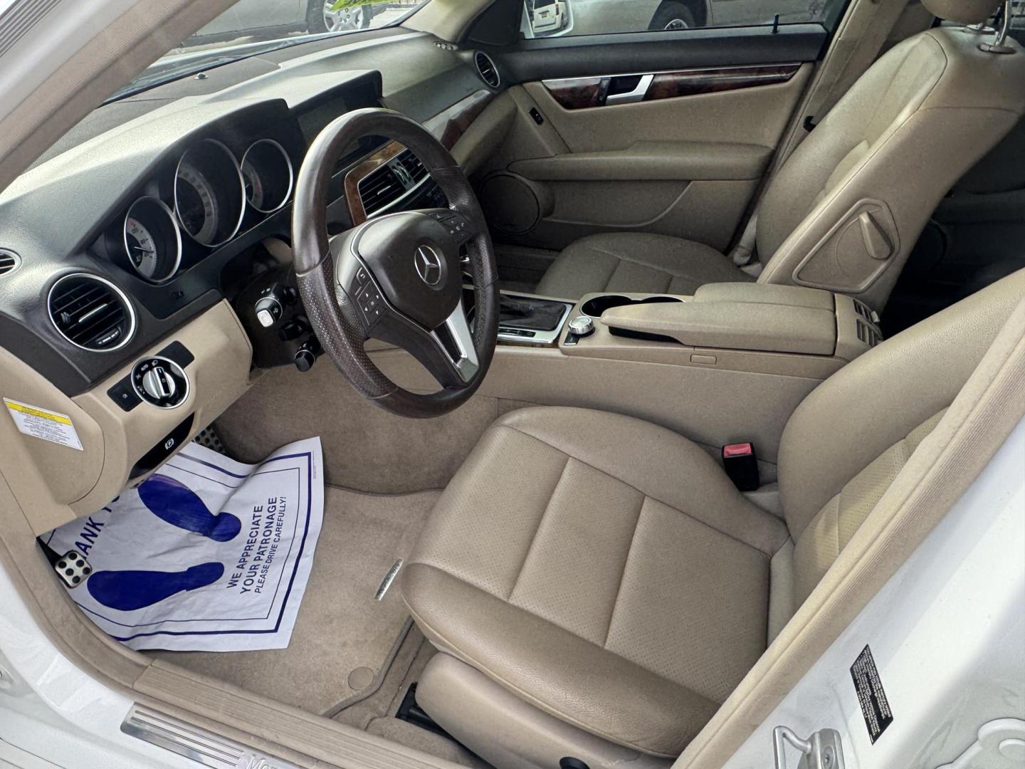 2013 White /Tan Mercedes-Benz C-Class C250 Sport Sedan (WDDGF4HBXDR) with an 3.0L V6 DOHC 16V engine, 7-Speed Automatic transmission, located at 2190 Hwy 95, Bullhead City, AZ, 86442, (928) 704-0060, 0.000000, 0.000000 - 2013 Mercedes Benz C250. Only 82k miles . Custom stereo fresh window tint . , moonroof . Backup camera . Navigation. . Free warranty . Free CARFAX . In house financing - Photo#17
