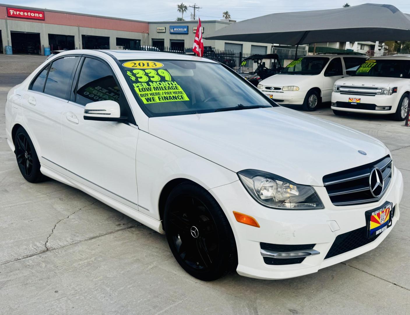 2013 White /Tan Mercedes-Benz C-Class C250 Sport Sedan (WDDGF4HBXDR) with an 3.0L V6 DOHC 16V engine, 7-Speed Automatic transmission, located at 2190 Hwy 95, Bullhead City, AZ, 86442, (928) 704-0060, 0.000000, 0.000000 - 2013 Mercedes Benz C250. Only 82k miles . Custom stereo fresh window tint . , moonroof . Backup camera . Navigation. . Free warranty . Free CARFAX . In house financing - Photo#5