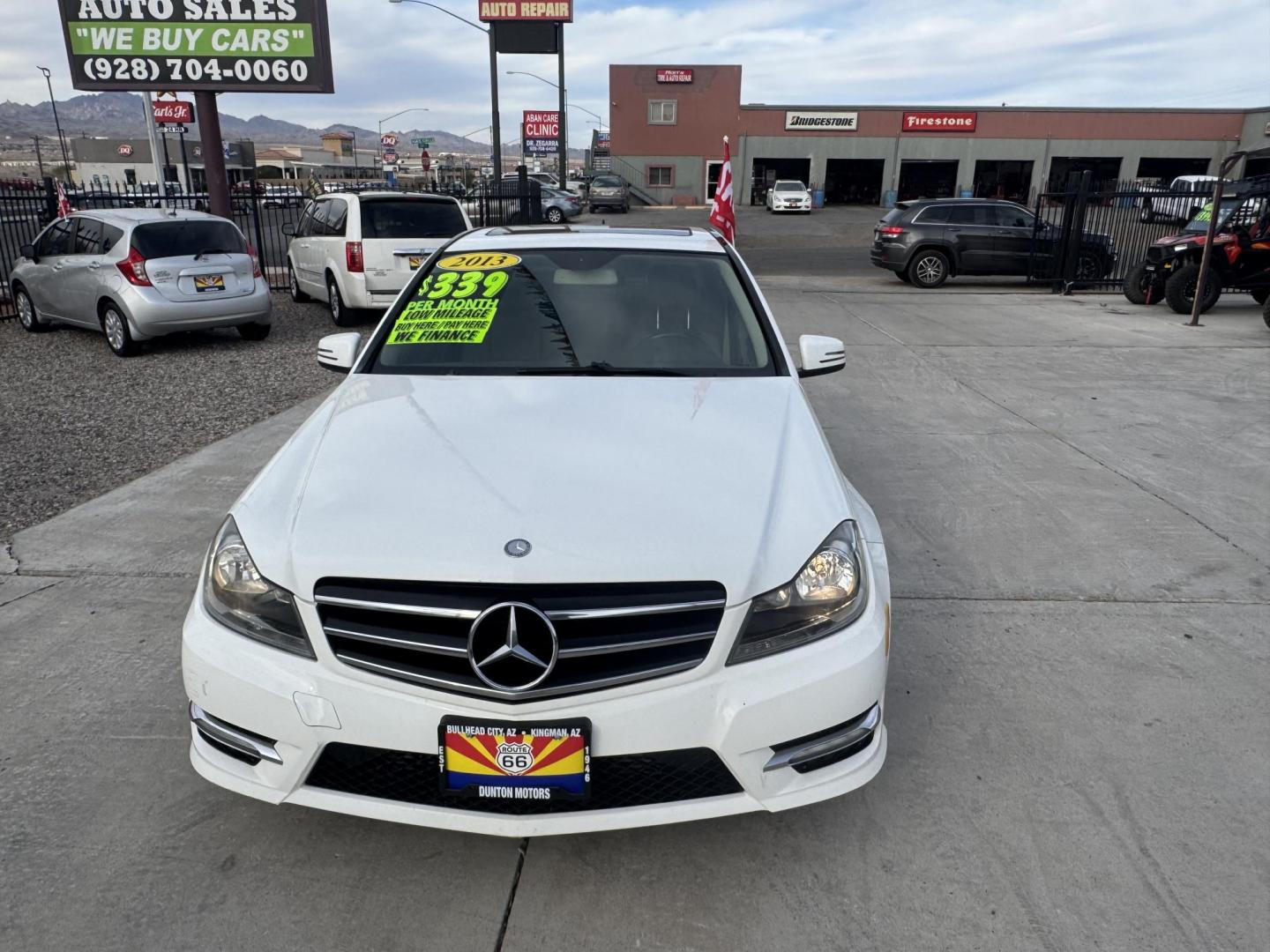2013 White /Tan Mercedes-Benz C-Class C250 Sport Sedan (WDDGF4HBXDR) with an 3.0L V6 DOHC 16V engine, 7-Speed Automatic transmission, located at 2190 Hwy 95, Bullhead City, AZ, 86442, (928) 704-0060, 0.000000, 0.000000 - 2013 Mercedes Benz C250. Only 82k miles . Custom stereo fresh window tint . , moonroof . Backup camera . Navigation. . Free warranty . Free CARFAX . In house financing - Photo#6