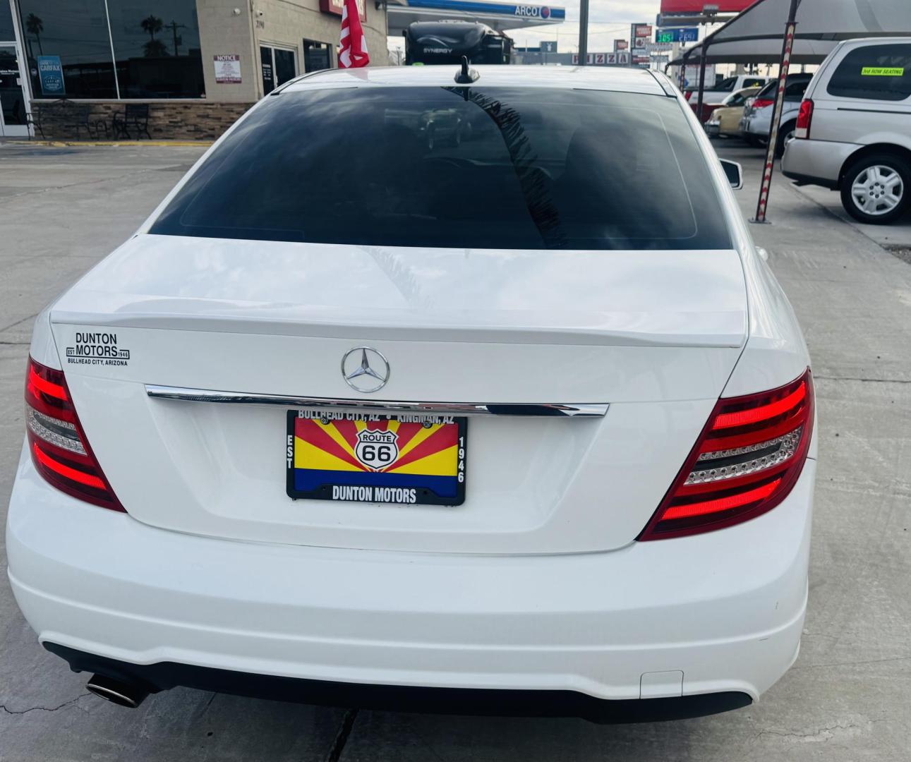 2013 White /Tan Mercedes-Benz C-Class C250 Sport Sedan (WDDGF4HBXDR) with an 3.0L V6 DOHC 16V engine, 7-Speed Automatic transmission, located at 2190 Hwy 95, Bullhead City, AZ, 86442, (928) 704-0060, 0.000000, 0.000000 - 2013 Mercedes Benz C250. Only 82k miles . Custom stereo fresh window tint . , moonroof . Backup camera . Navigation. . Free warranty . Free CARFAX . In house financing - Photo#9