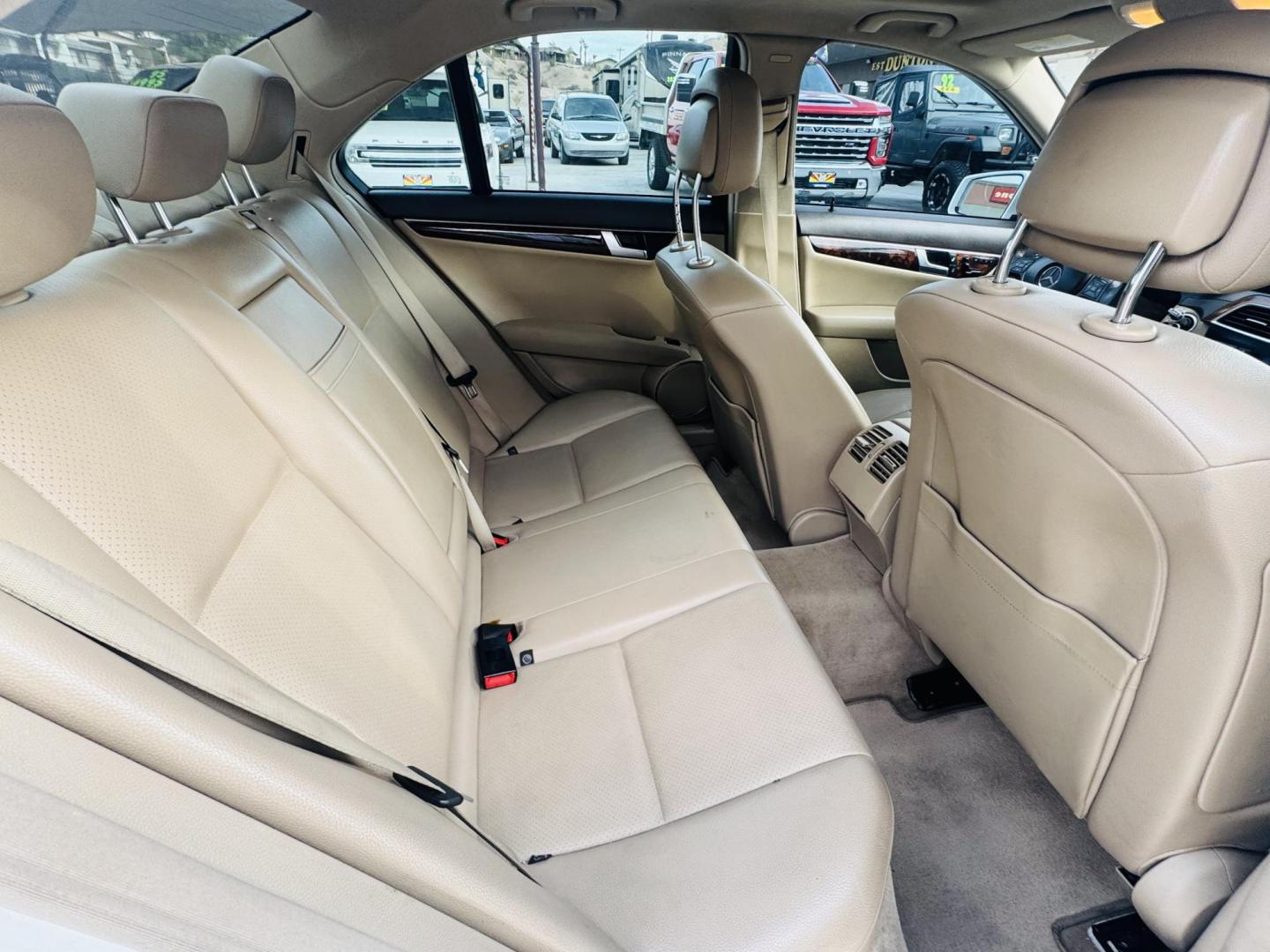 2013 White /Tan Mercedes-Benz C-Class C250 Sport Sedan (WDDGF4HBXDR) with an 3.0L V6 DOHC 16V engine, 7-Speed Automatic transmission, located at 2190 Hwy 95, Bullhead City, AZ, 86442, (928) 704-0060, 0.000000, 0.000000 - 2013 Mercedes Benz C250. Only 82k miles . Custom stereo fresh window tint . , moonroof . Backup camera . Navigation. . Free warranty . Free CARFAX . In house financing - Photo#8