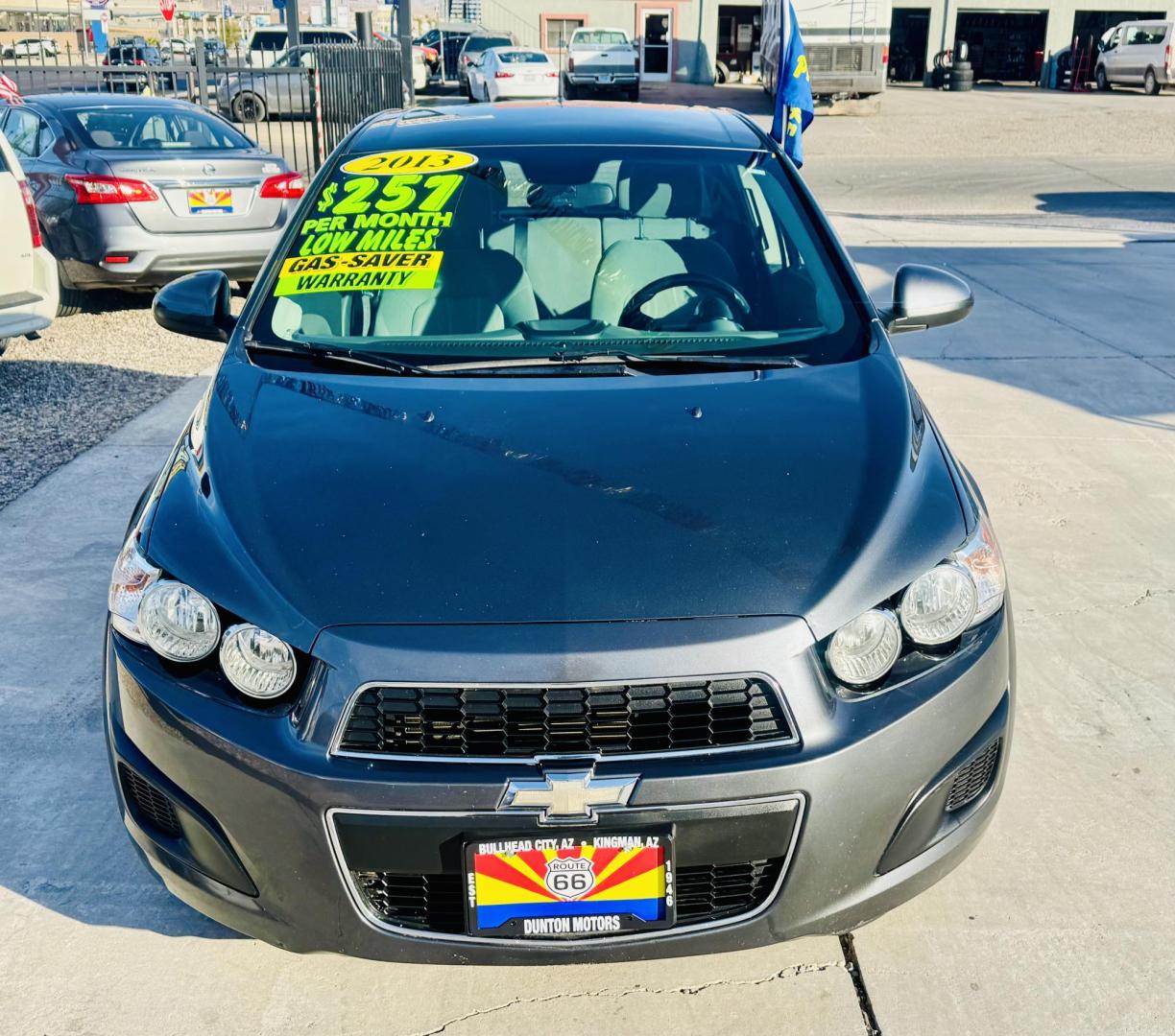 2013 grey Chevrolet Sonic LT Auto 5-Door (1G1JC6SG4D4) with an 1.8L L4 DOHC 24V engine, 6-Speed Automatic transmission, located at 2190 Hwy 95, Bullhead City, AZ, 86442, (928) 704-0060, 0.000000, 0.000000 - Photo#1