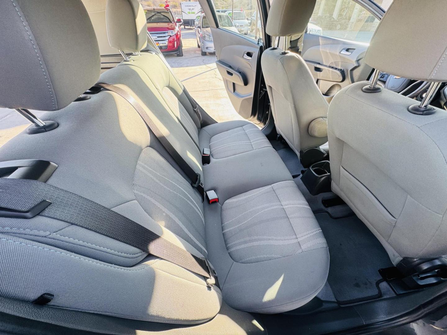 2013 grey Chevrolet Sonic LT Auto 5-Door (1G1JC6SG4D4) with an 1.8L L4 DOHC 24V engine, 6-Speed Automatic transmission, located at 2190 Hwy 95, Bullhead City, AZ, 86442, (928) 704-0060, 0.000000, 0.000000 - Photo#14