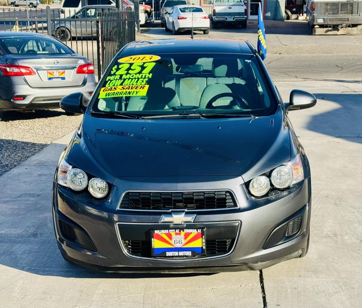 2013 grey Chevrolet Sonic LT Auto 5-Door (1G1JC6SG4D4) with an 1.8L L4 DOHC 24V engine, 6-Speed Automatic transmission, located at 2190 Hwy 95, Bullhead City, AZ, 86442, (928) 704-0060, 0.000000, 0.000000 - Photo#4