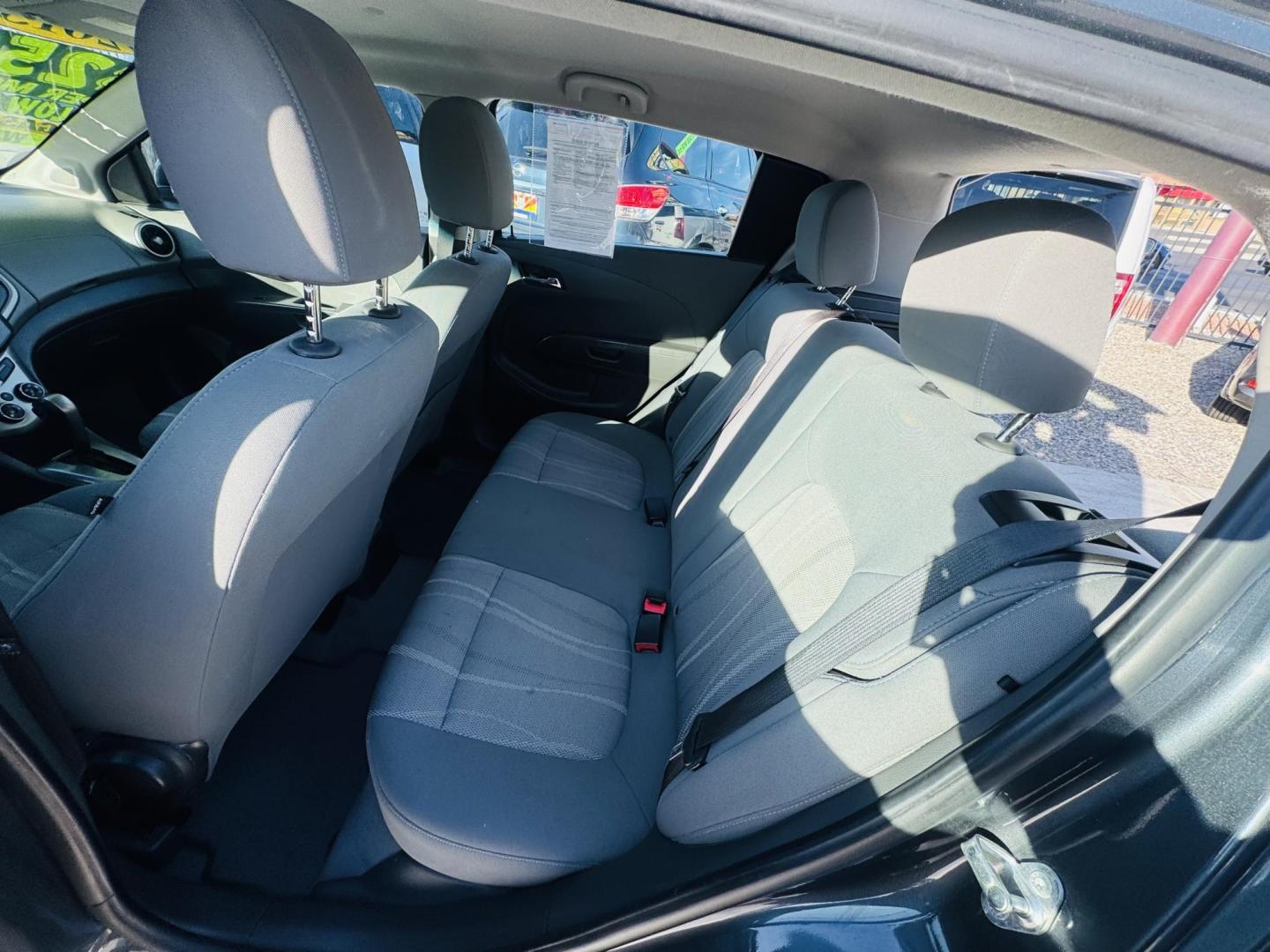 2013 grey Chevrolet Sonic LT Auto 5-Door (1G1JC6SG4D4) with an 1.8L L4 DOHC 24V engine, 6-Speed Automatic transmission, located at 2190 Hwy 95, Bullhead City, AZ, 86442, (928) 704-0060, 0.000000, 0.000000 - Photo#10
