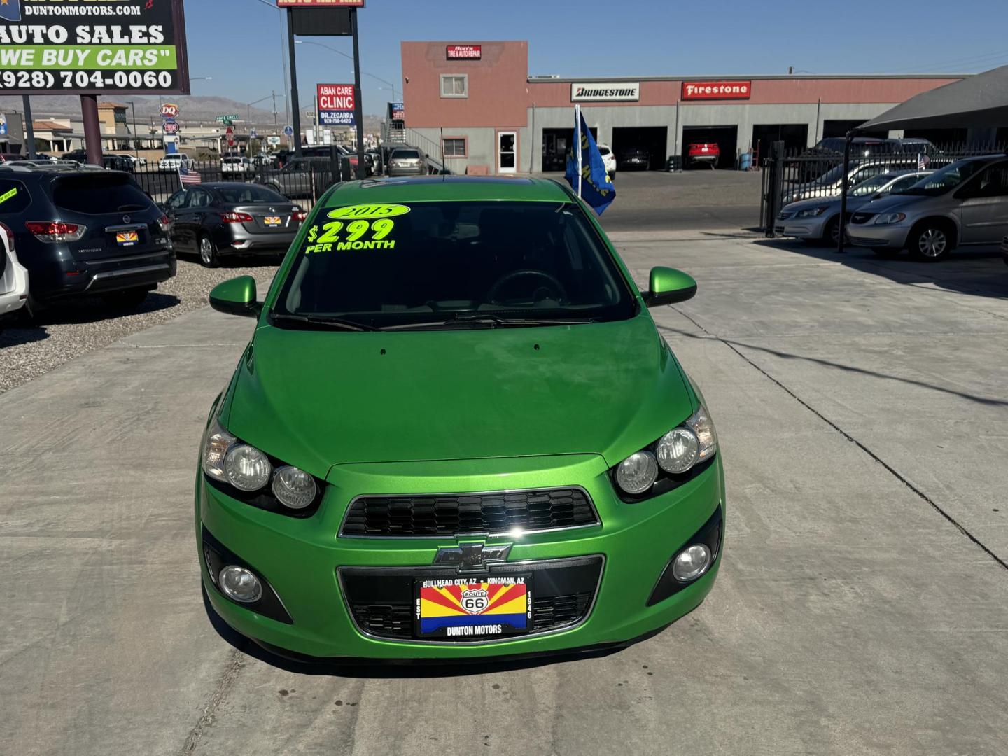 2015 Lime Green Chevrolet Sonic LT Auto Sedan (1G1JC5SB0F4) with an 1.4L L4 DOHC 24V TURBO engine, 6-Speed Automatic transmission, located at 2190 Hwy 95, Bullhead City, AZ, 86442, (928) 704-0060, 0.000000, 0.000000 - 1 owner. custom tires/ wheels. rare lime green color. we finance - Photo#5