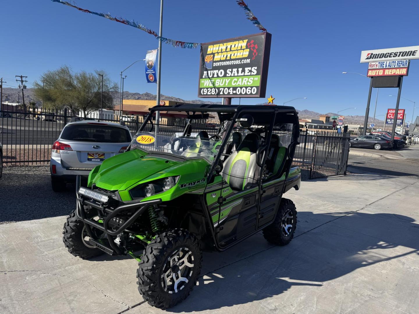 2018 green Kawasaki Teryx - (JKBRTCG12JB) , located at 2190 Hwy 95, Bullhead City, AZ, 86442, (928) 704-0060, 0.000000, 0.000000 - 1 owner lots of extras. hard top rear spare mount and carrier. 3 rear seats. seats 5. always garaged. - Photo#1