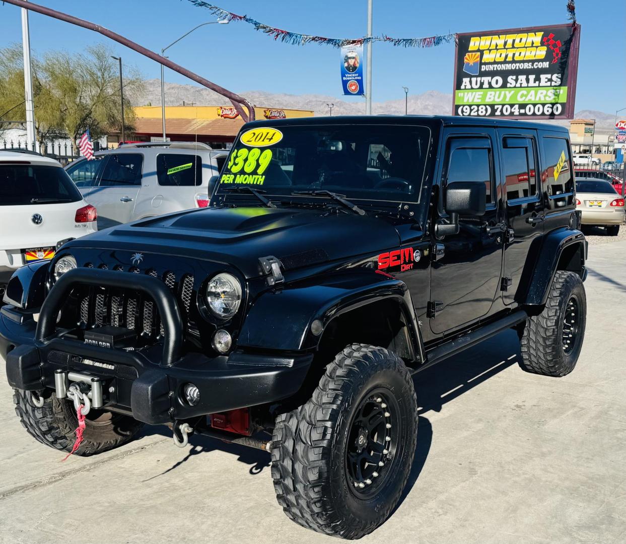 2014 Black Jeep Wrangler Unlimited Rubicon 4WD (1C4BJWFG0EL) with an 3.6L V6 DOHC 24V FFV engine, located at 2190 Hwy 95, Bullhead City, AZ, 86442, (928) 704-0060, 0.000000, 0.000000 - 2014 Jeep wrangler Rubicon. Automatic 4x4. hard top. carbon custom hood. 4 in lift kit with 33 in tires. Lots of extras, full size spare, on board compressor. satellite radio, leather, navigation. Top of the line for jeeps. v6. 110k miles. In excellent shape. free and clear title. Financing availabl - Photo#1
