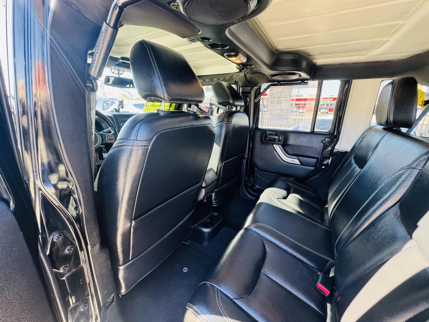 2014 Black Jeep Wrangler Unlimited Rubicon 4WD (1C4BJWFG0EL) with an 3.6L V6 DOHC 24V FFV engine, located at 2190 Hwy 95, Bullhead City, AZ, 86442, (928) 704-0060, 0.000000, 0.000000 - 2014 Jeep wrangler Rubicon. Automatic 4x4. hard top. carbon custom hood. 4 in lift kit with 33 in tires. Lots of extras, full size spare, on board compressor. satellite radio, leather, navigation. Top of the line for jeeps. v6. 110k miles. In excellent shape. free and clear title. Financing availabl - Photo#17