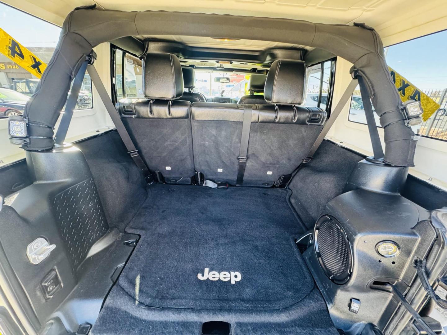 2014 Black Jeep Wrangler Unlimited Rubicon 4WD (1C4BJWFG0EL) with an 3.6L V6 DOHC 24V FFV engine, located at 2190 Hwy 95, Bullhead City, AZ, 86442, (928) 704-0060, 0.000000, 0.000000 - 2014 Jeep wrangler Rubicon. Automatic 4x4. hard top. carbon custom hood. 4 in lift kit with 33 in tires. Lots of extras, full size spare, on board compressor. satellite radio, leather, navigation. Top of the line for jeeps. v6. 110k miles. In excellent shape. free and clear title. Financing availabl - Photo#21