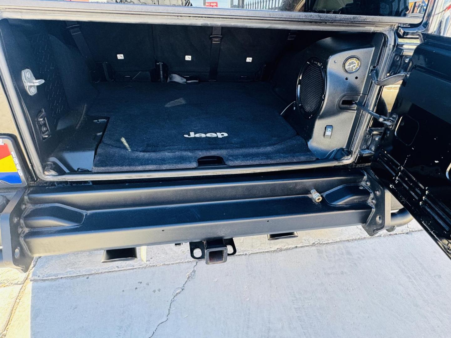 2014 Black Jeep Wrangler Unlimited Rubicon 4WD (1C4BJWFG0EL) with an 3.6L V6 DOHC 24V FFV engine, located at 2190 Hwy 95, Bullhead City, AZ, 86442, (928) 704-0060, 0.000000, 0.000000 - 2014 Jeep wrangler Rubicon. Automatic 4x4. hard top. carbon custom hood. 4 in lift kit with 33 in tires. Lots of extras, full size spare, on board compressor. satellite radio, leather, navigation. Top of the line for jeeps. v6. 110k miles. In excellent shape. free and clear title. Financing availabl - Photo#22