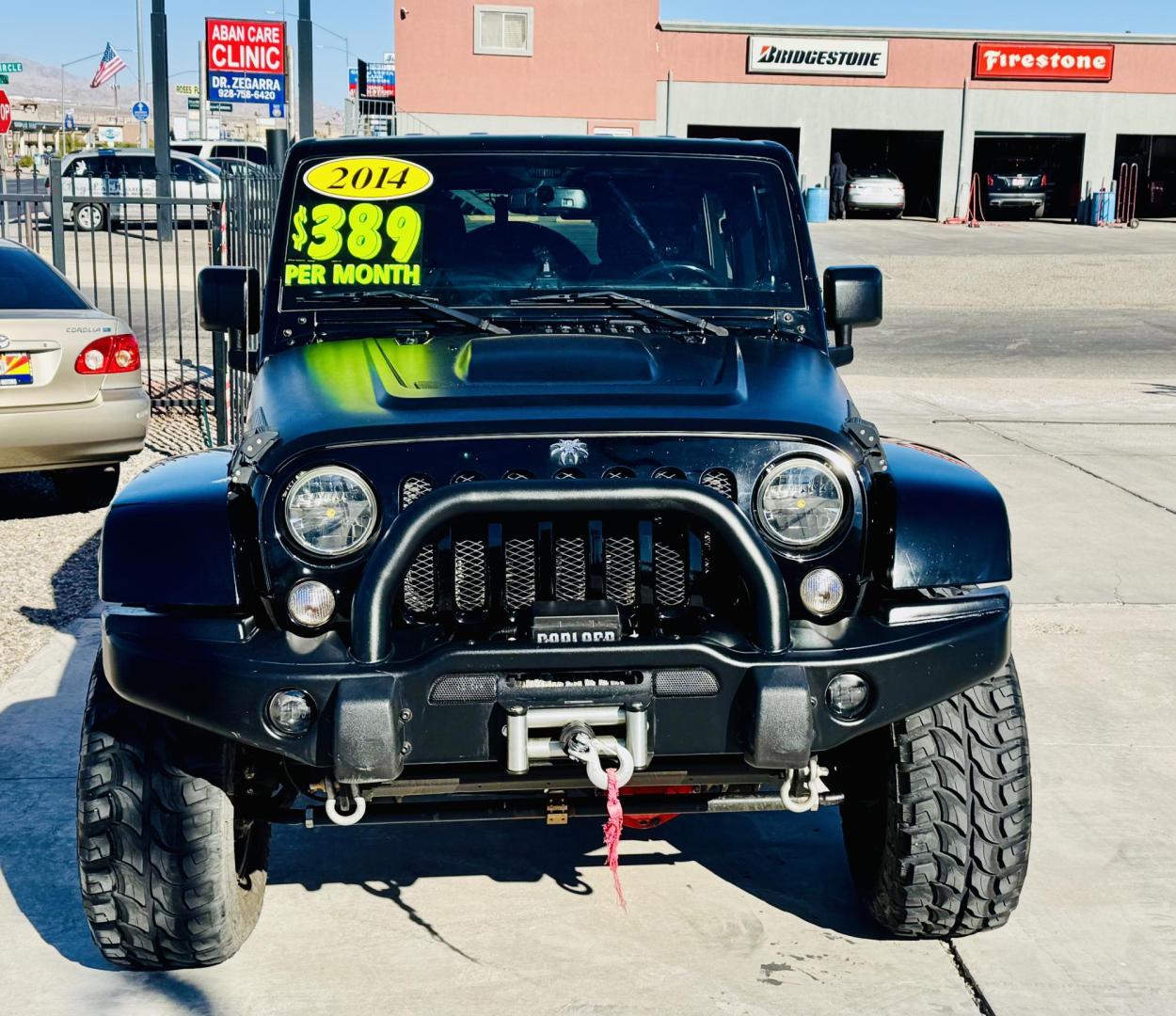 2014 Black Jeep Wrangler Unlimited Rubicon 4WD (1C4BJWFG0EL) with an 3.6L V6 DOHC 24V FFV engine, located at 2190 Hwy 95, Bullhead City, AZ, 86442, (928) 704-0060, 0.000000, 0.000000 - 2014 Jeep wrangler Rubicon. Automatic 4x4. hard top. carbon custom hood. 4 in lift kit with 33 in tires. Lots of extras, full size spare, on board compressor. satellite radio, leather, navigation. Top of the line for jeeps. v6. 110k miles. In excellent shape. free and clear title. Financing availabl - Photo#20